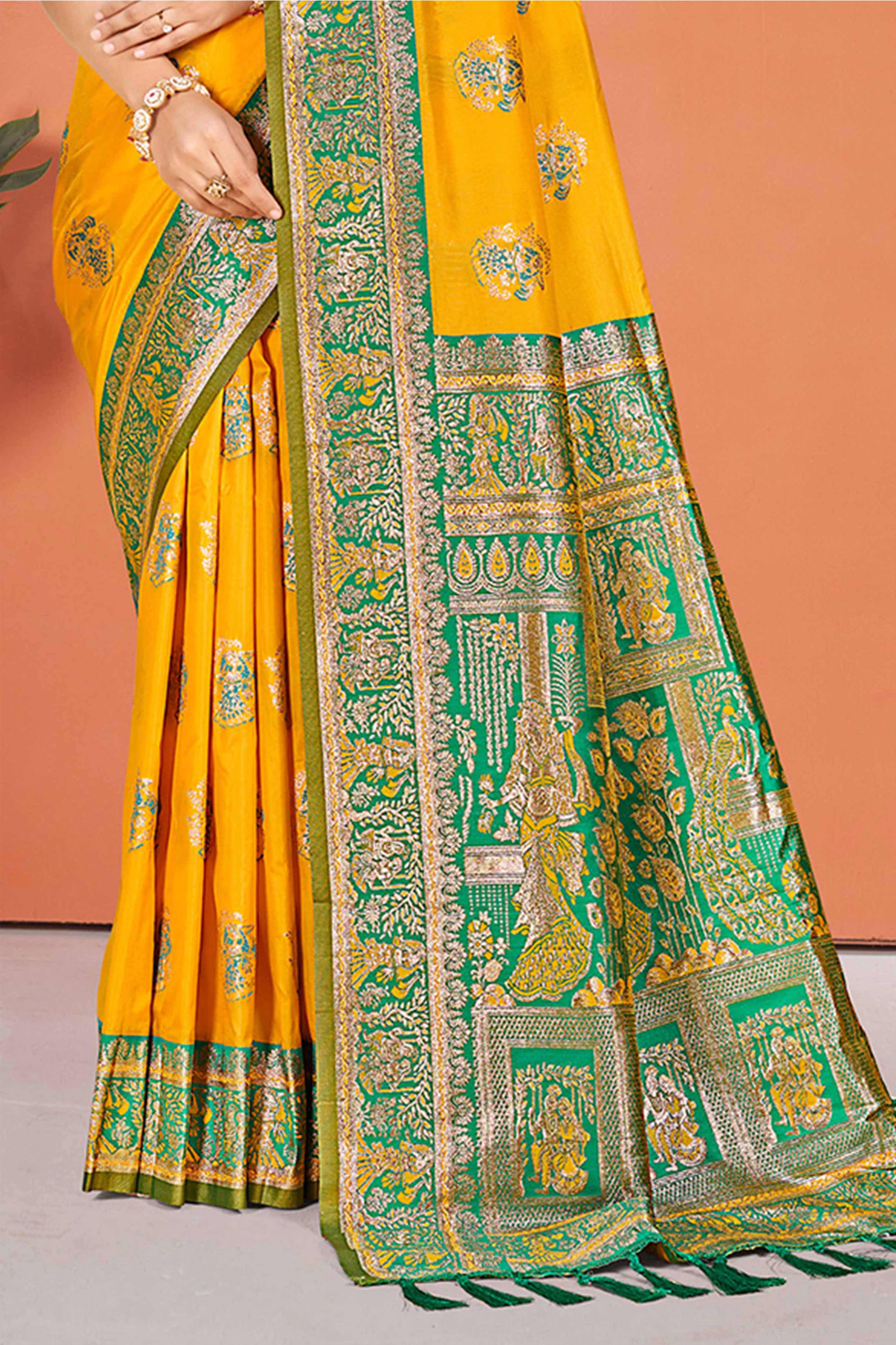 Mustard Traditional Zari Weaving Silk Blend Saree Accented With Tassel Pallu