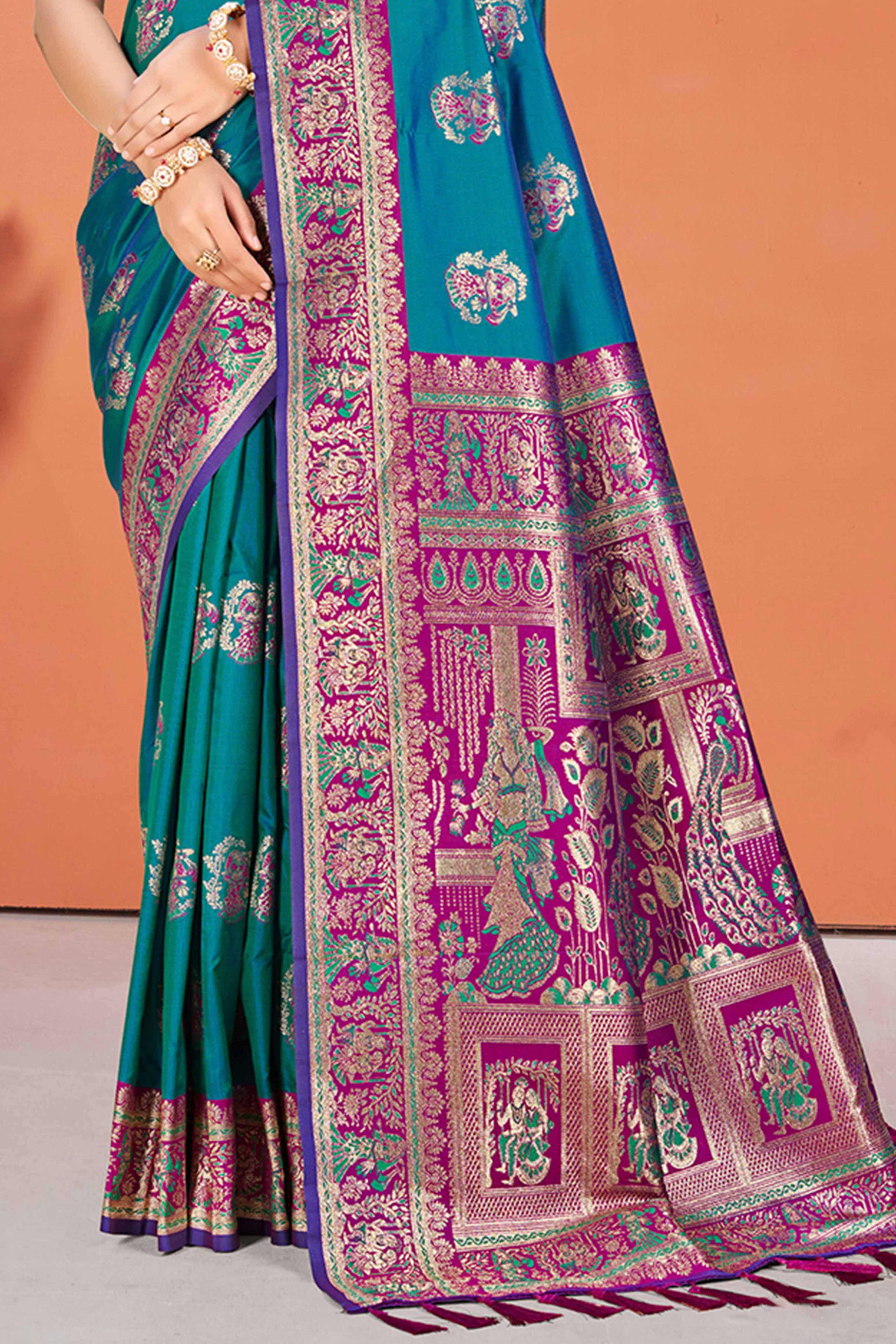 Morpich Blue Traditional Zari Weaving Silk Blend Saree Accented With Tassel Pallu