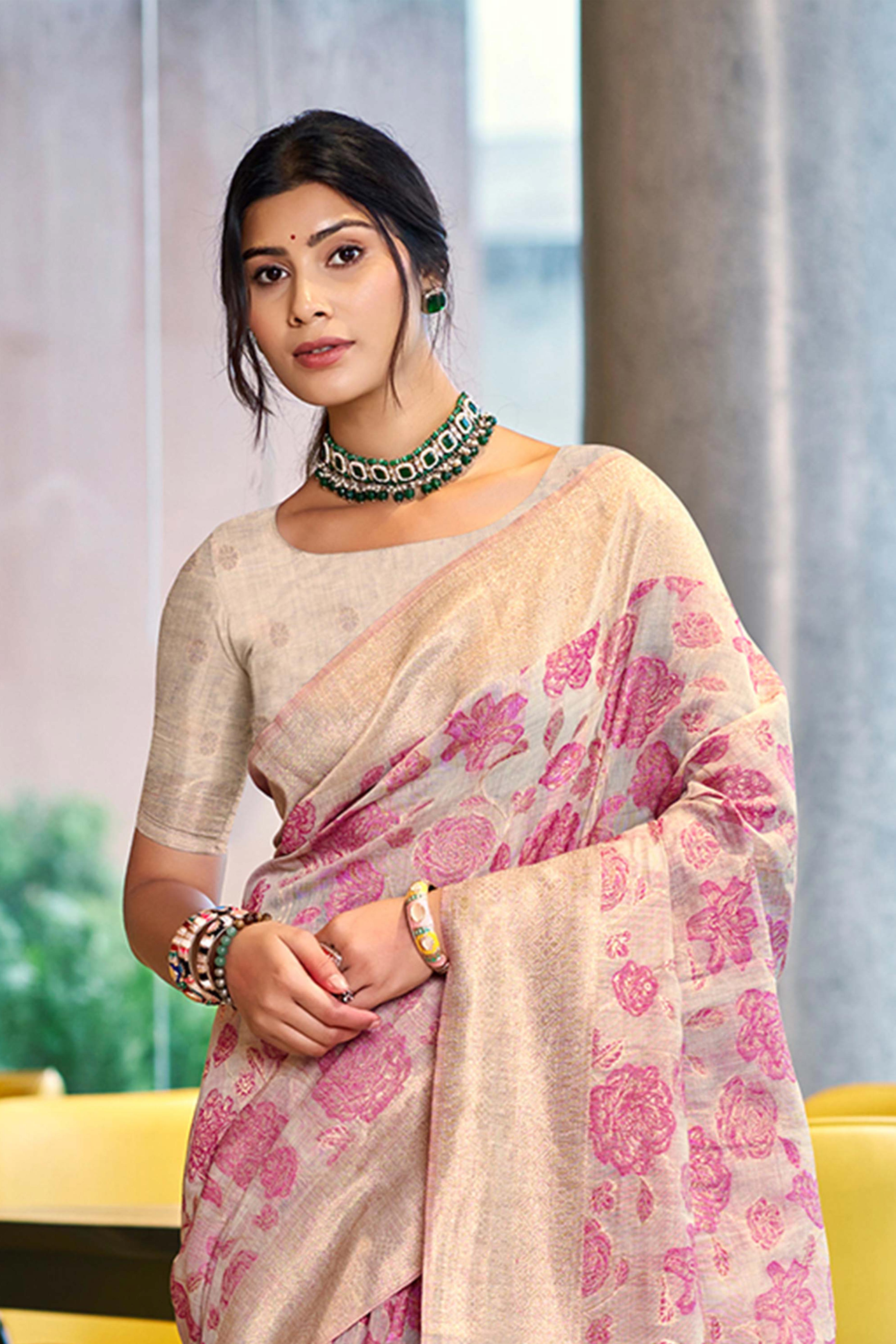 Pink Premium Cotton Silk Saree Highlighted With Floral Weaving Work & Tassel Pallu