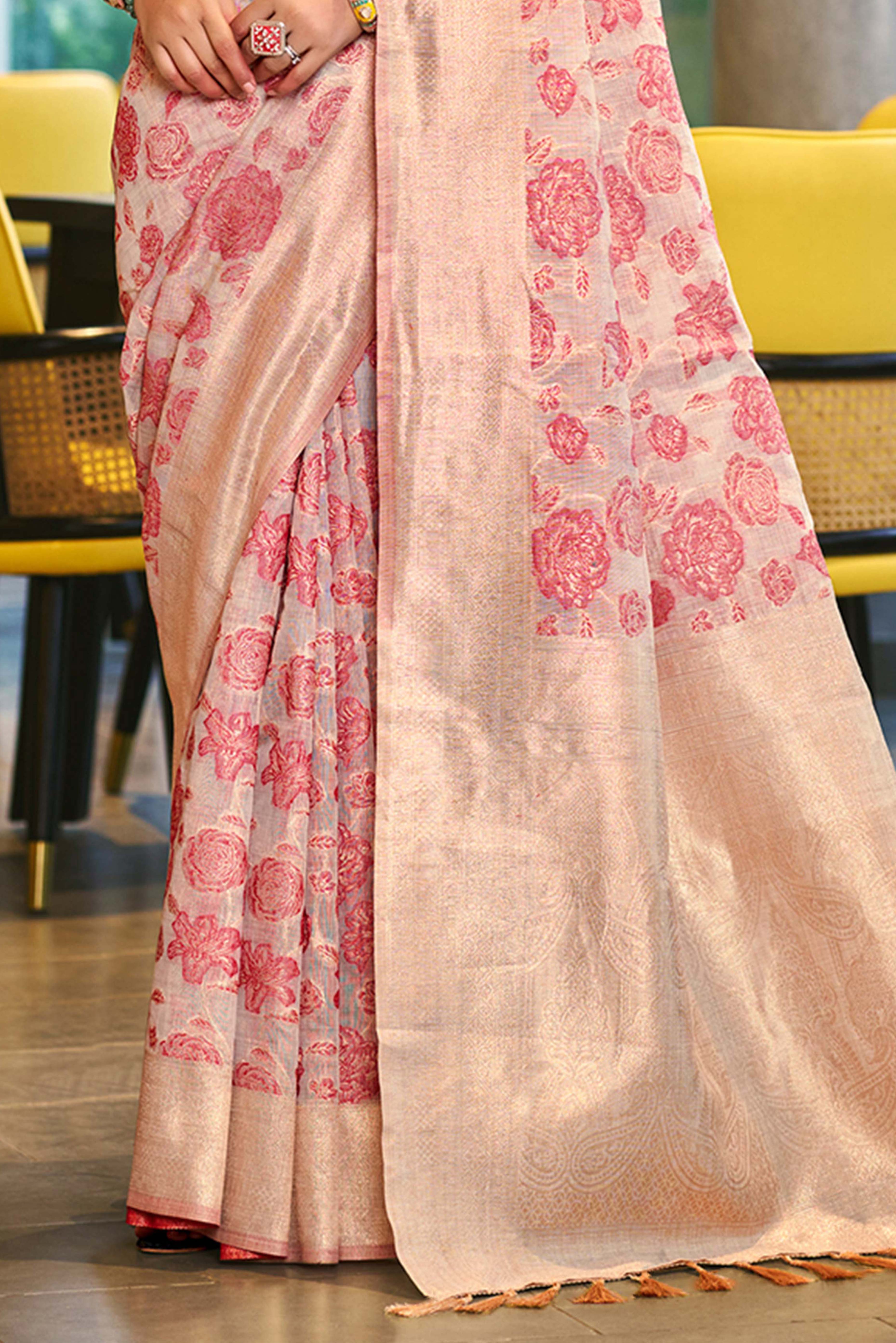 Pastel Pink Premium Cotton Silk Saree Highlighted With Floral Weaving Work & Tassel Pallu