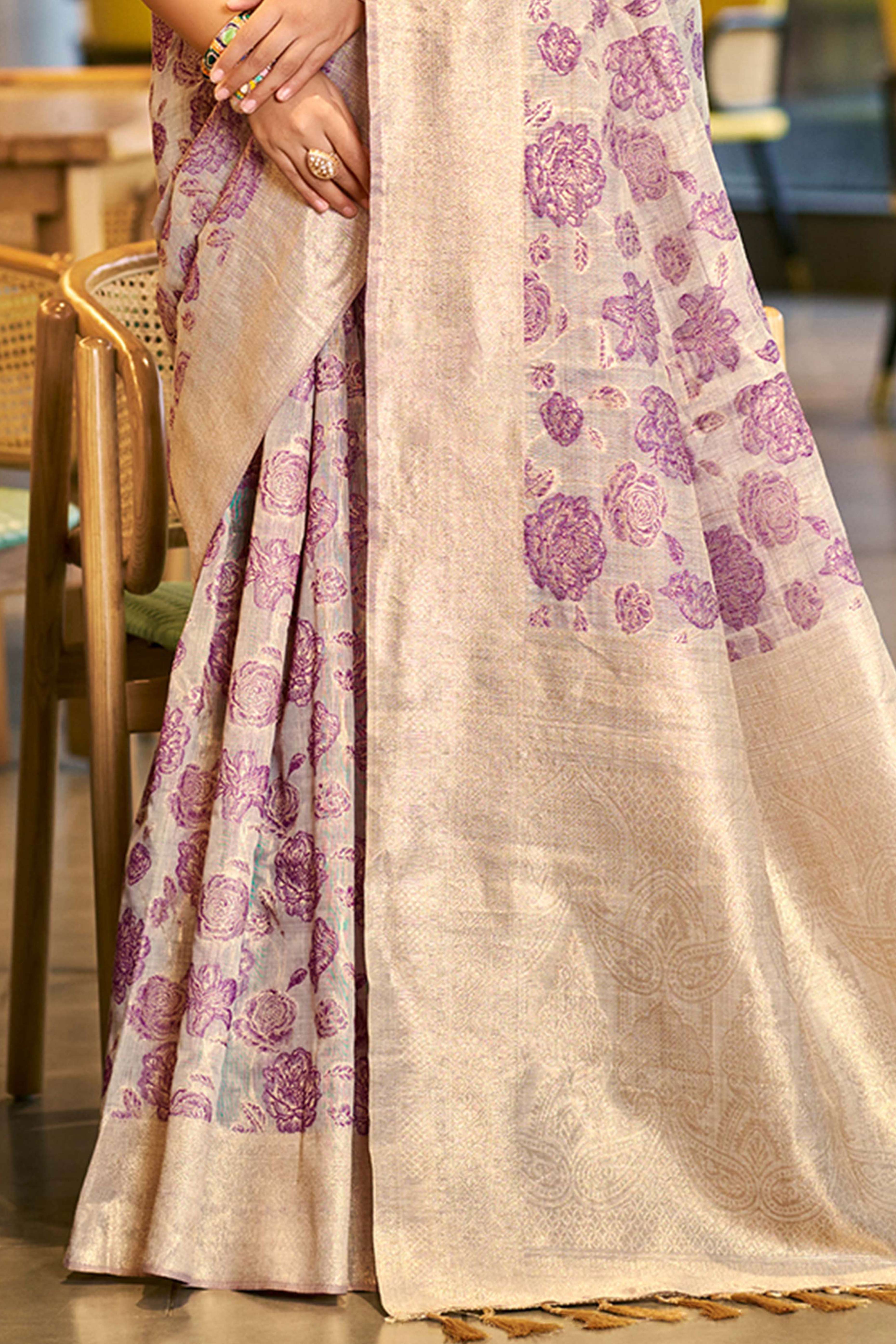 Purple Premium Cotton Silk Saree Highlighted With Floral Weaving Work & Tassel Pallu