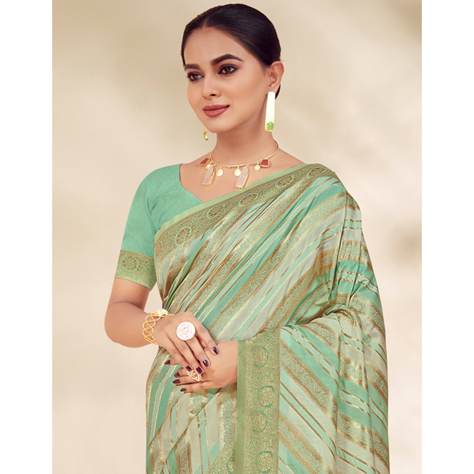 Pista Green Woven Cotton Silk Saree With Tassels