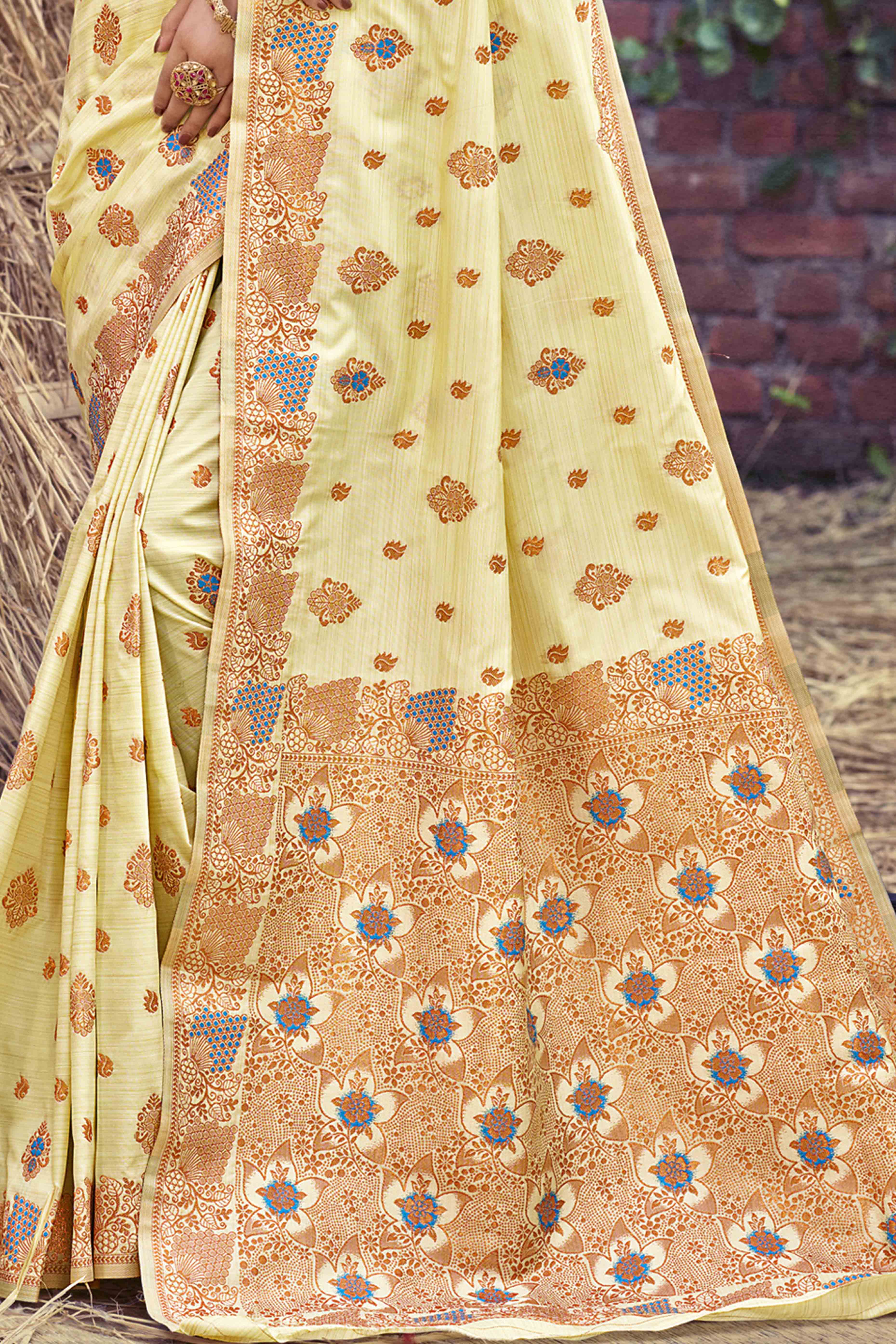Light Yellow Banarasi Silk Saree Adorned With Woven Zari Floral Motifs