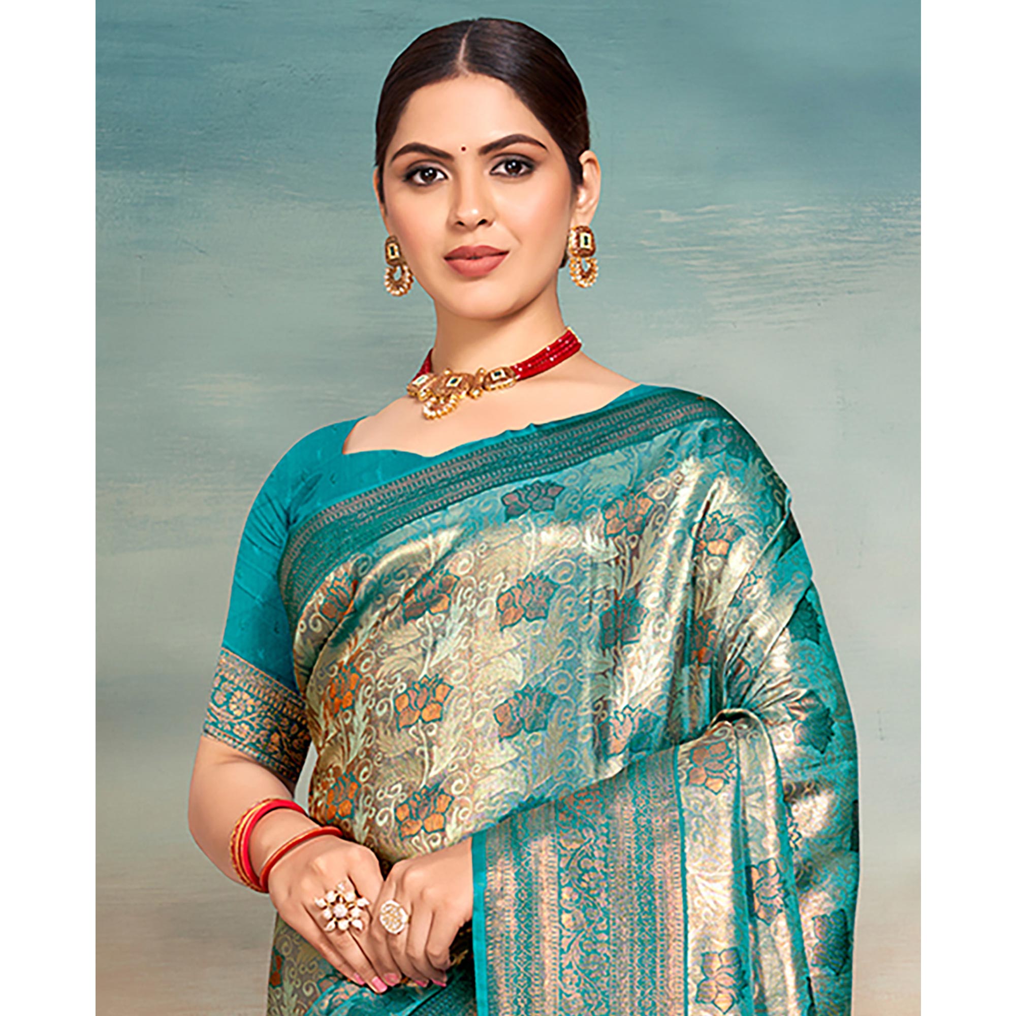 Turquoise Floral Woven Kanjivaram Silk Saree With Tassels
