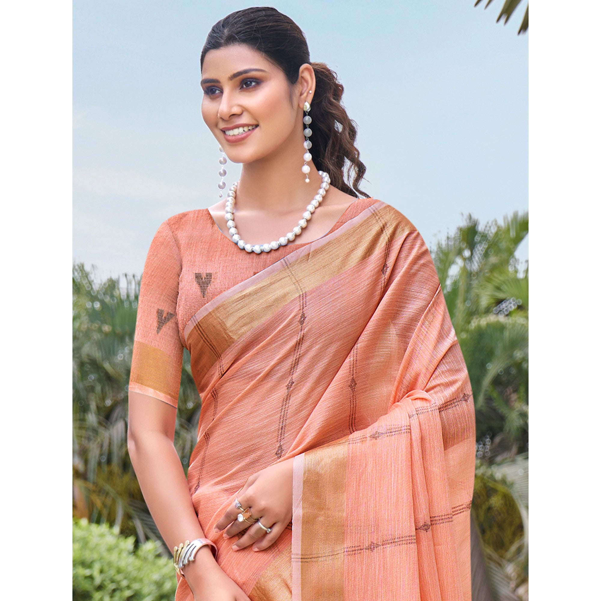 Peach Woven Cotton Blend Saree With Tassels