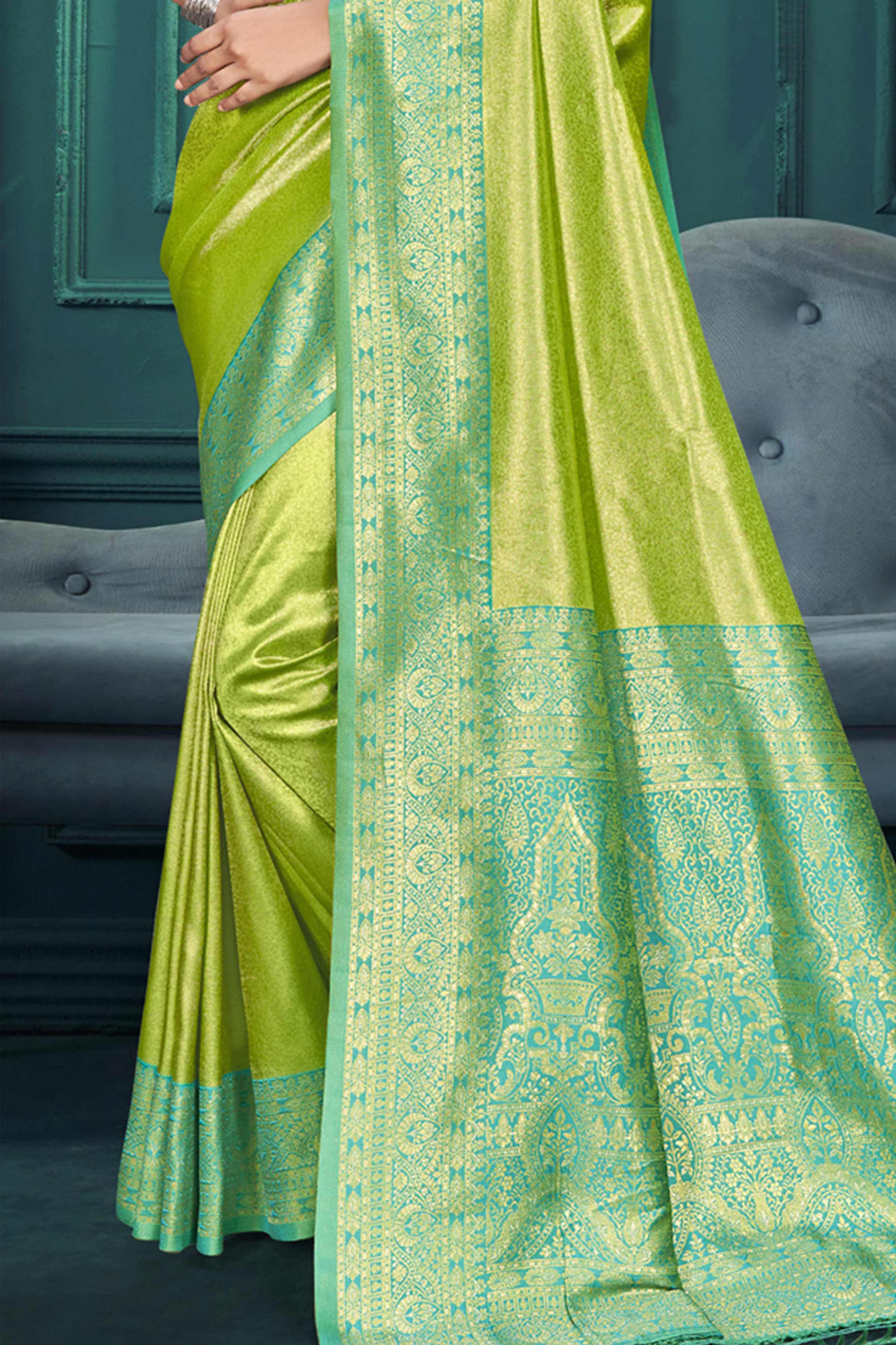 Exclusive Parrot Green Floral Motif Woven Kanjivaram Silk Saree With Graceful Tassel Pallu