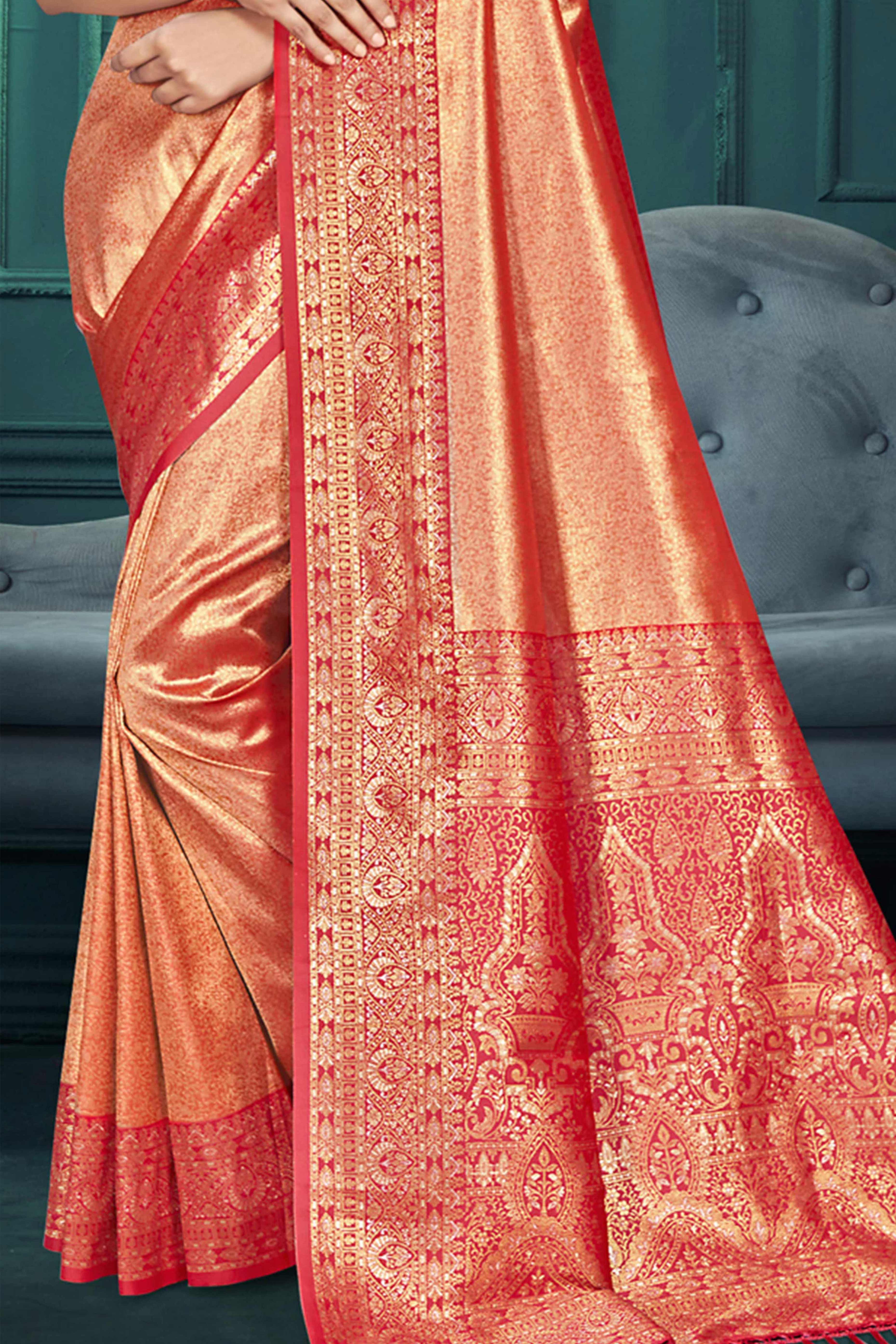 Exclusive Orange Floral Motif Woven Kanjivaram Silk Saree With Graceful Tassel Pallu