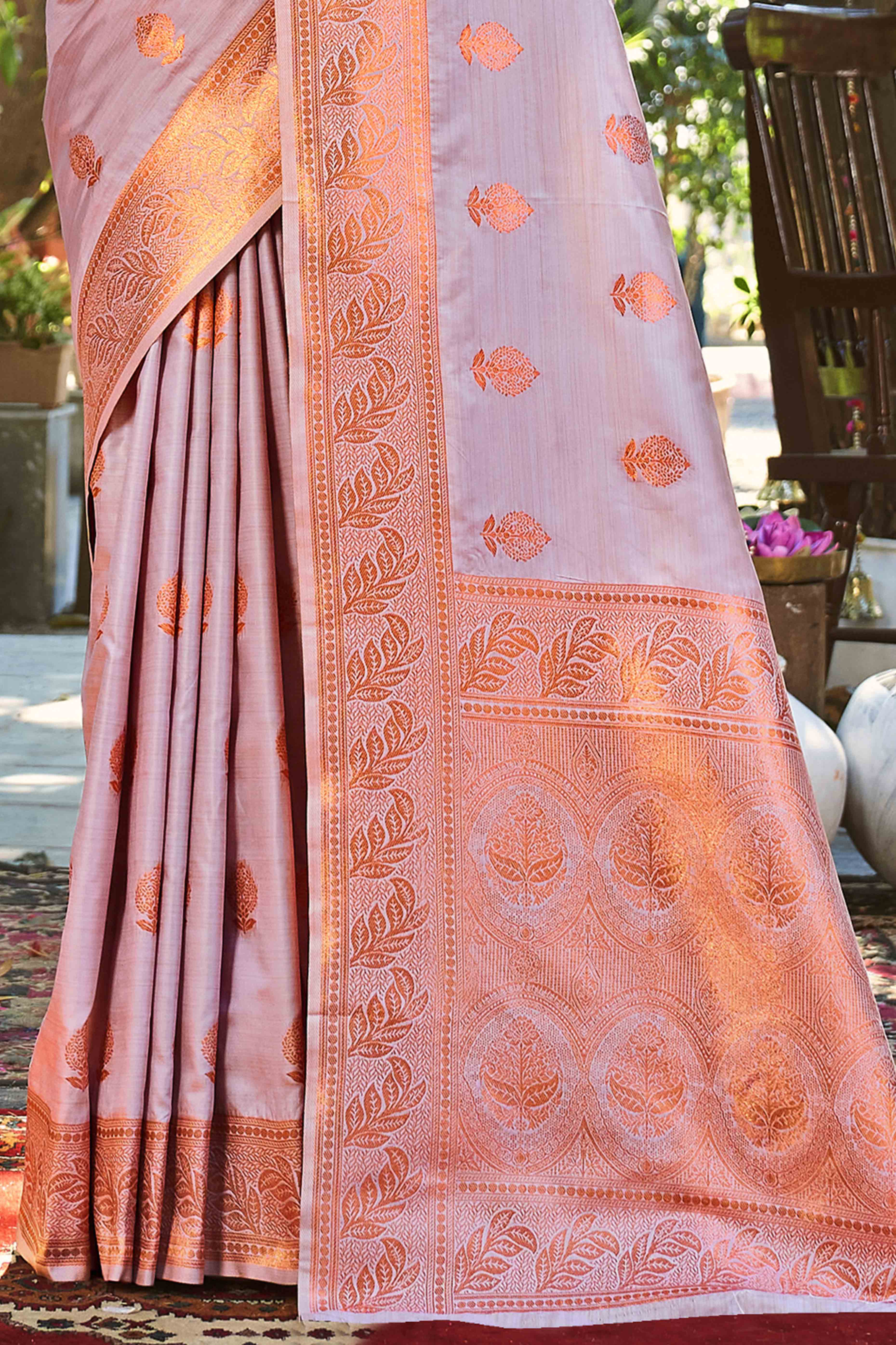 Dazzling Floral Zari Woven Banarasi Silk Saree In Onion