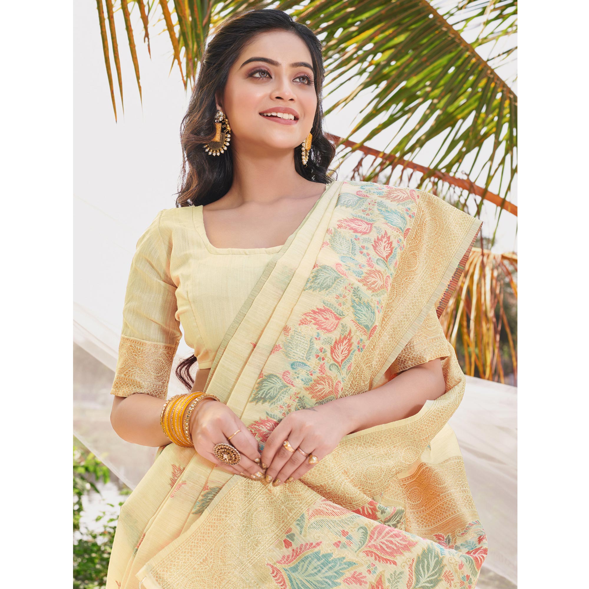 Yellow Floral Woven Cotton Silk Saree With Tassels