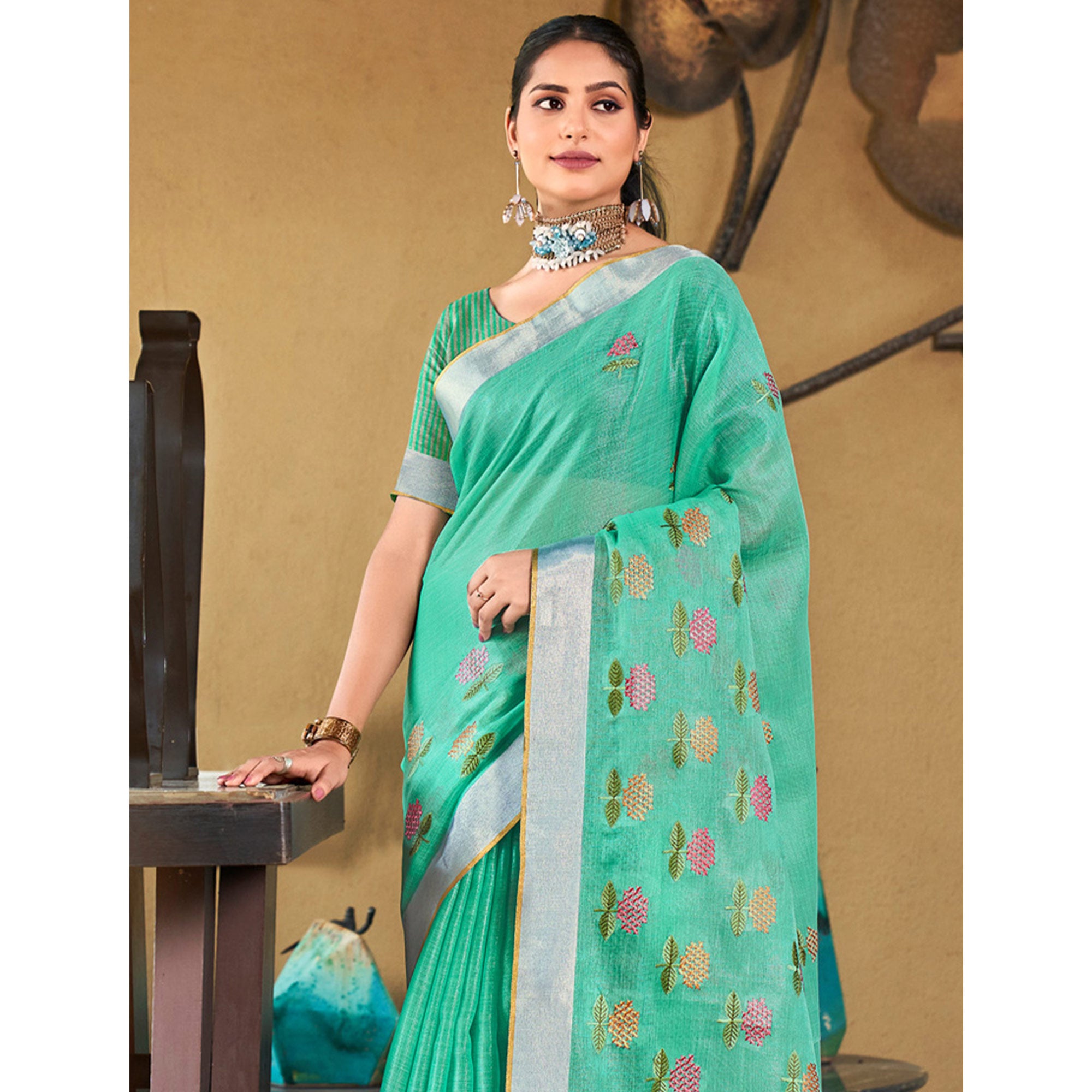 Sea Green Floral Embroidered Linen Saree With Tassels