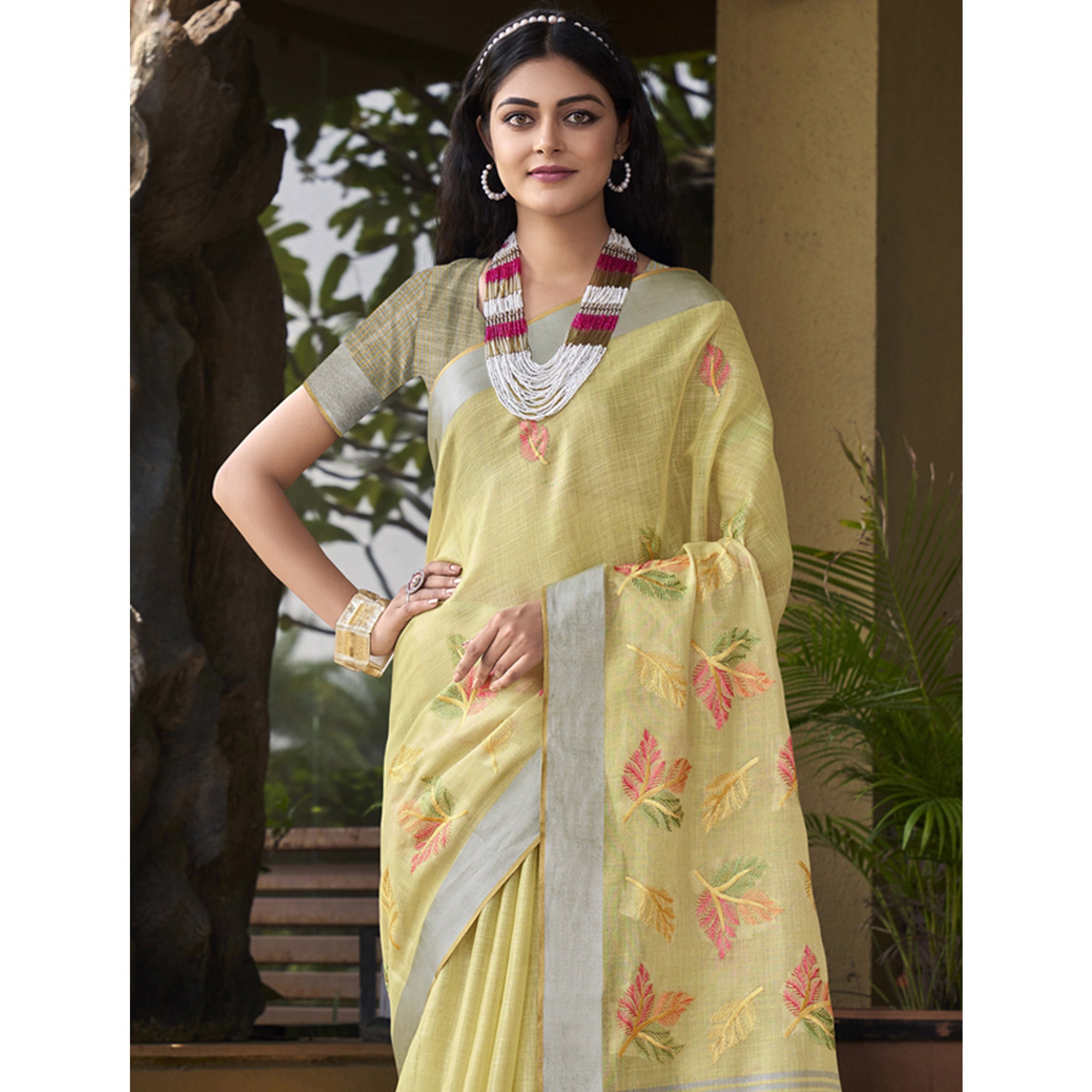 Yellow Floral Embroidered Linen Saree With Tassels