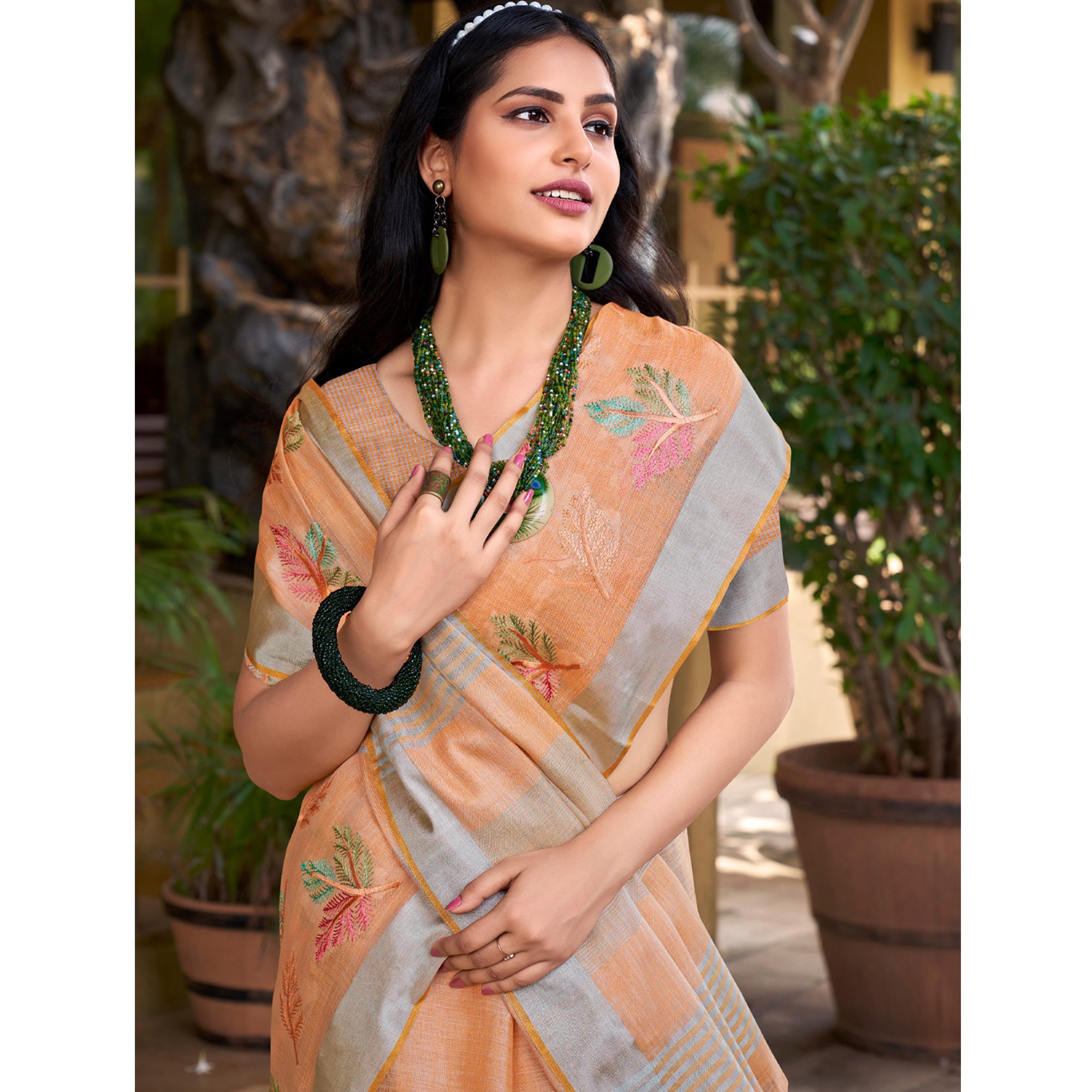 Orange Floral Embroidered Linen Saree With Tassels
