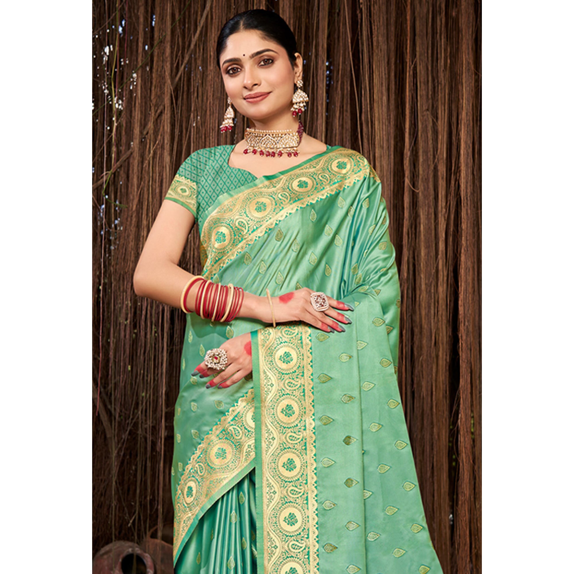 Sea Green Woven Satin Silk Saree With Tassels