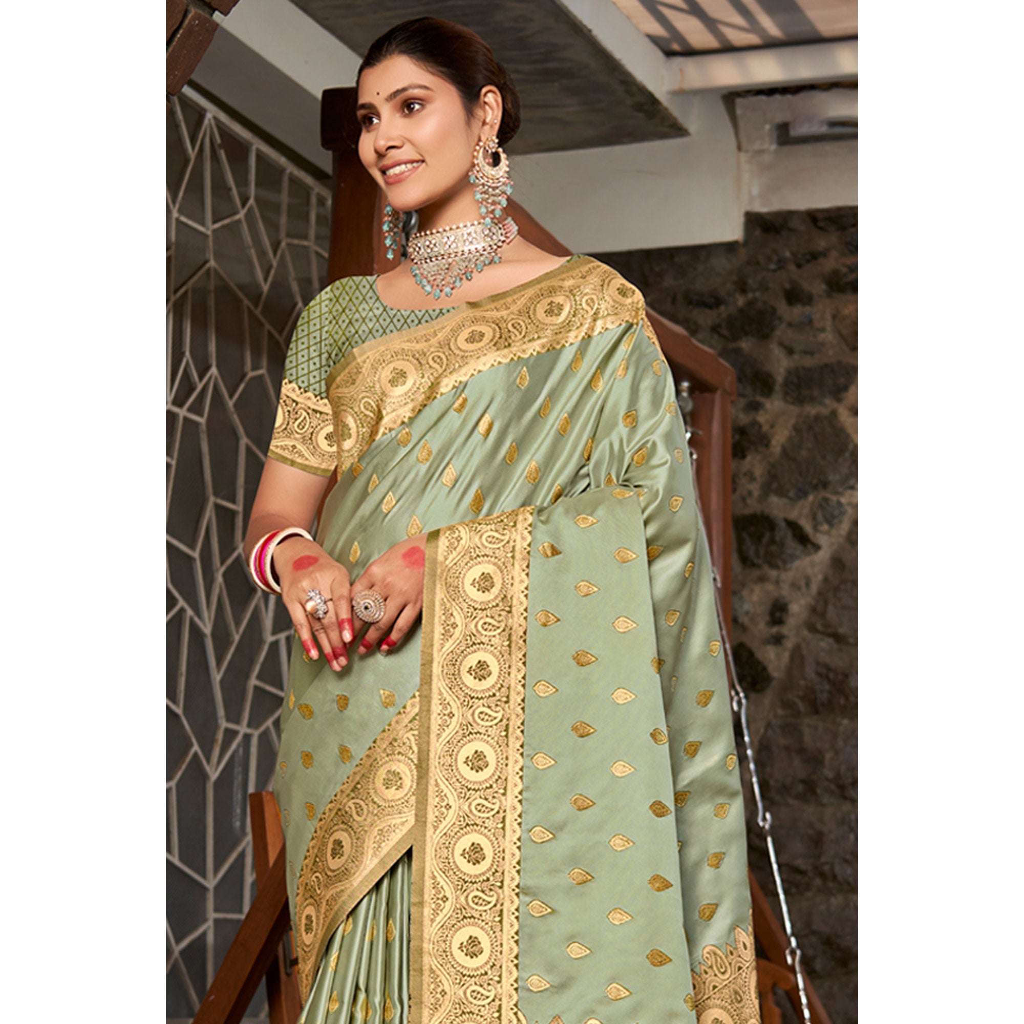 Light Green Woven Satin Silk Saree With Tassels