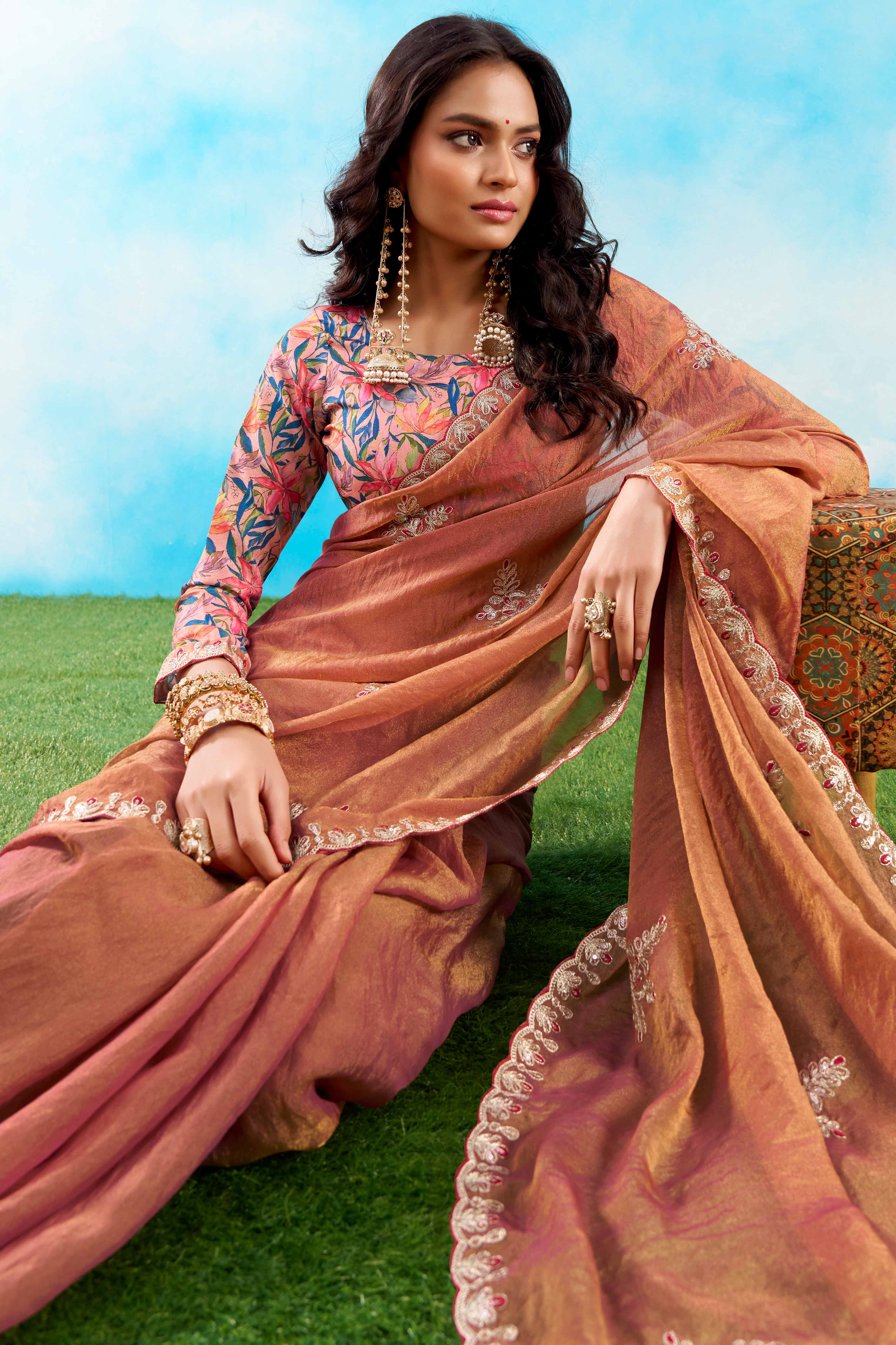 Luxurious Peach Chiffon Saree Showcasing Floral Sequins Embroidery In A Two Tone Finish