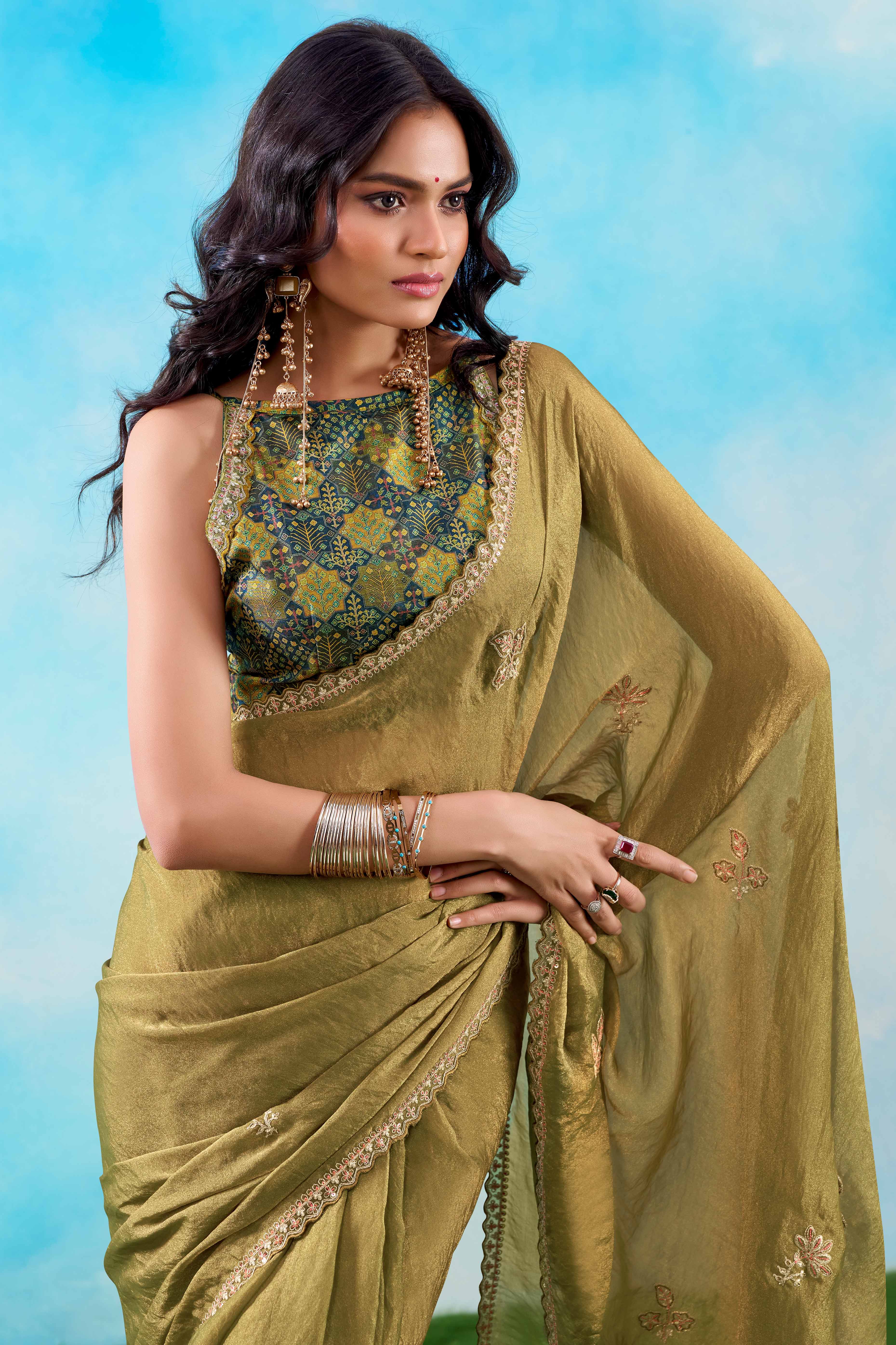 Luxurious Moss Green Chiffon Saree Showcasing Floral Sequins Embroidery In A Two Tone Finish