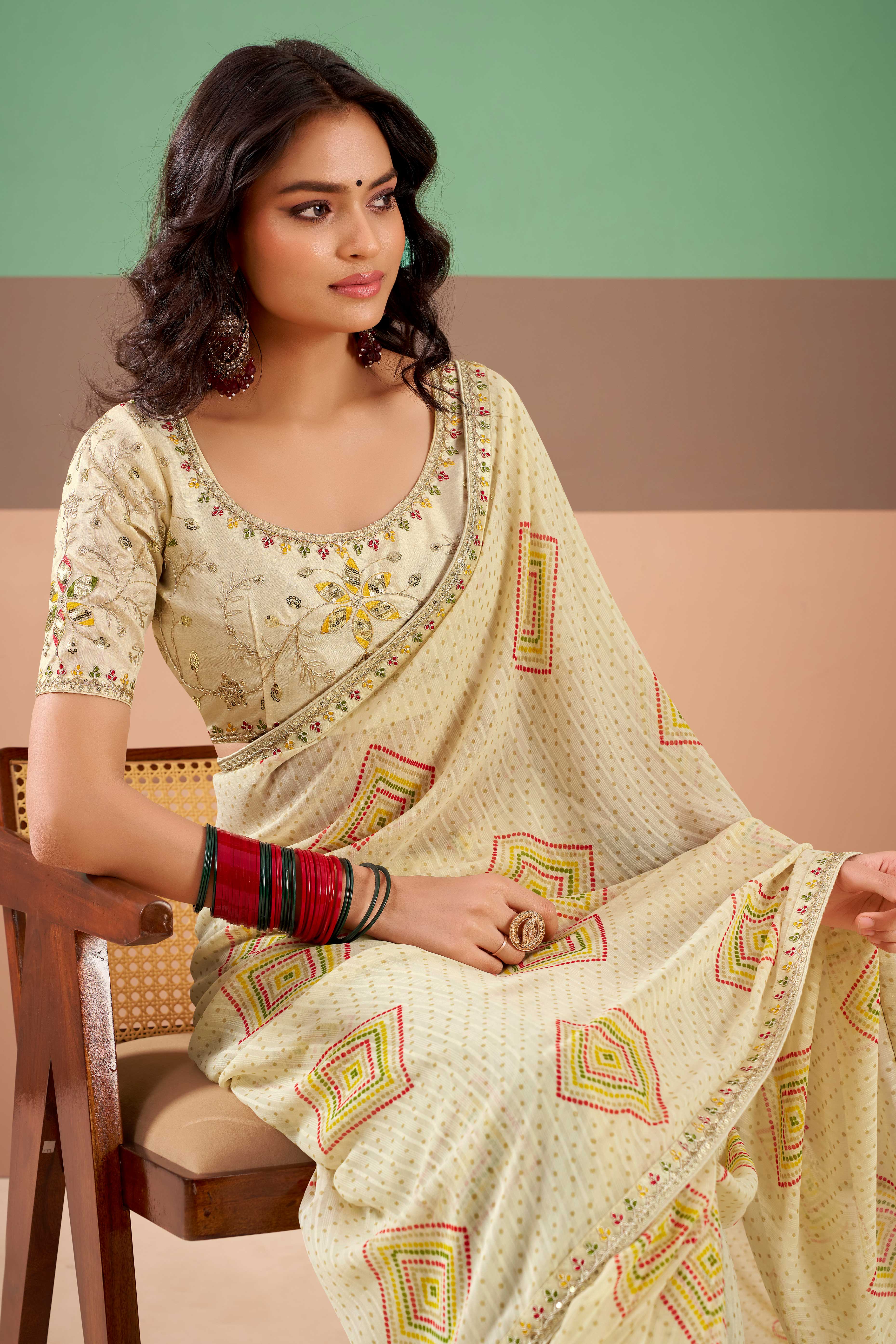 Charming Offwhite Bandhani Printed Georgette Saree Adorned With Cording Embroidered Border