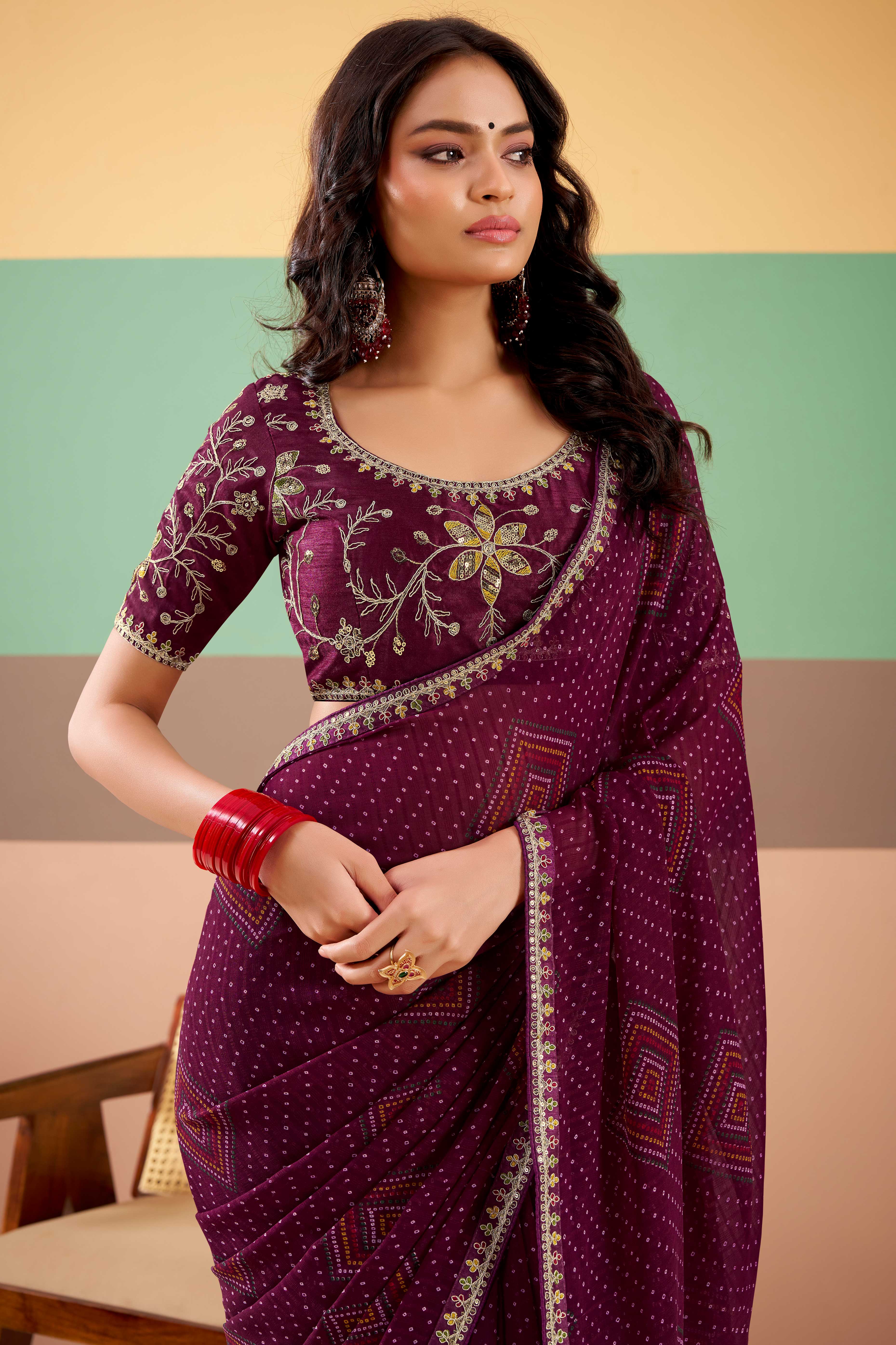 Charming Wine Bandhani Printed Georgette Saree Adorned With Intricate Cording Embroidered Border