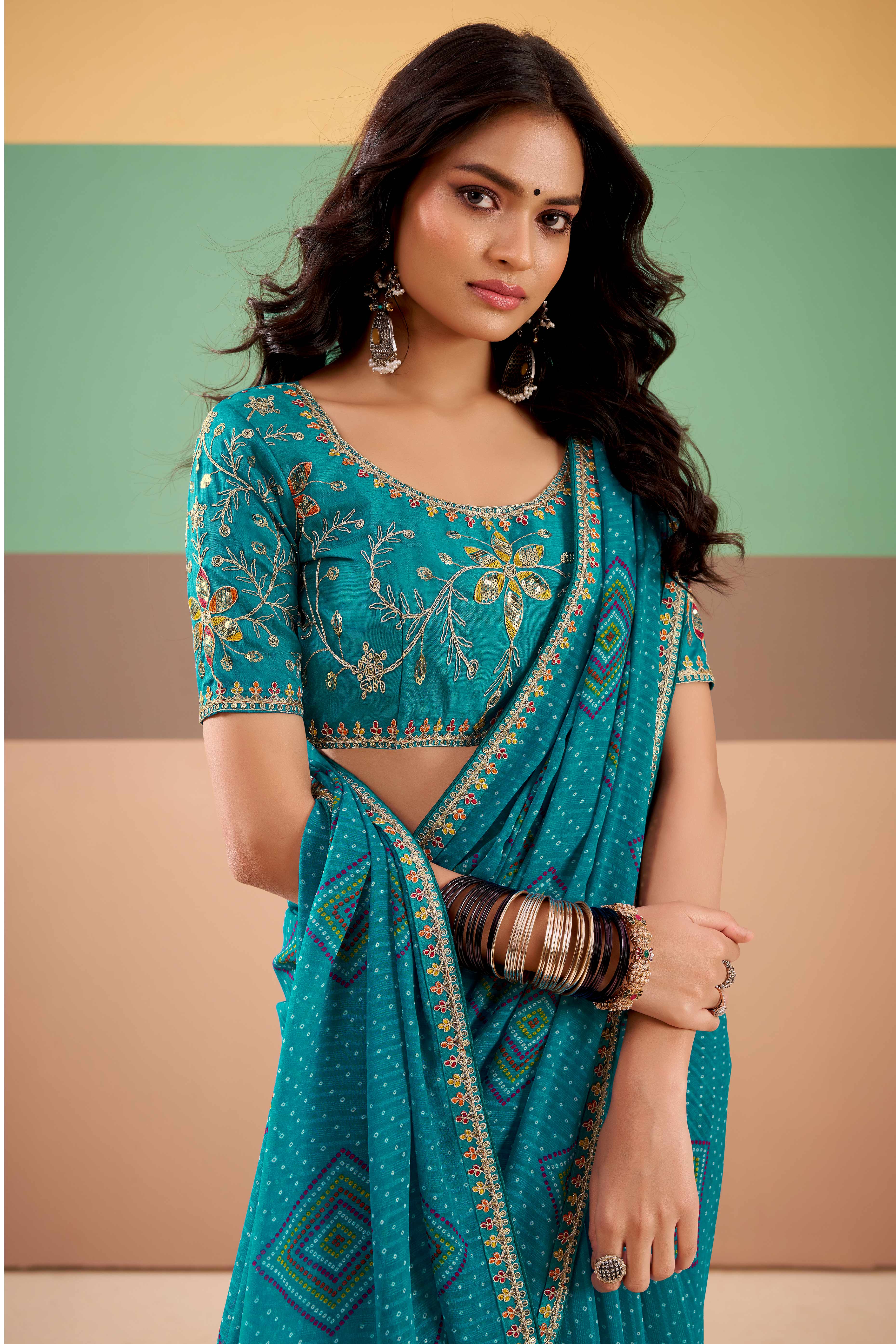 Charming Blue Bandhani Printed Georgette Saree Adorned With Intricate Cording Embroidered Border