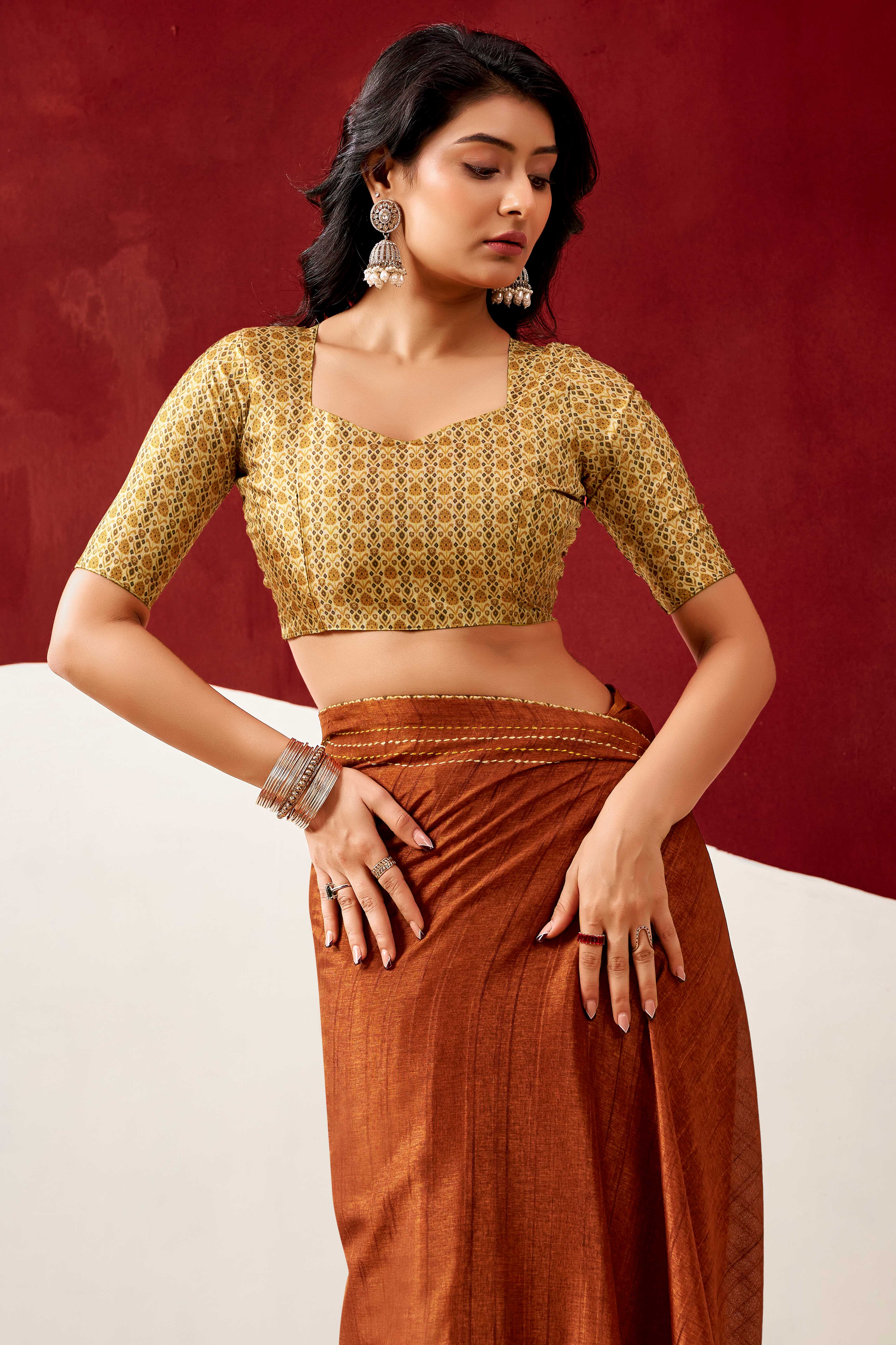 Graceful Rust Handloom Cotton Blend Saree Featuring Striped Lining Embroidery & Tassel Pallu