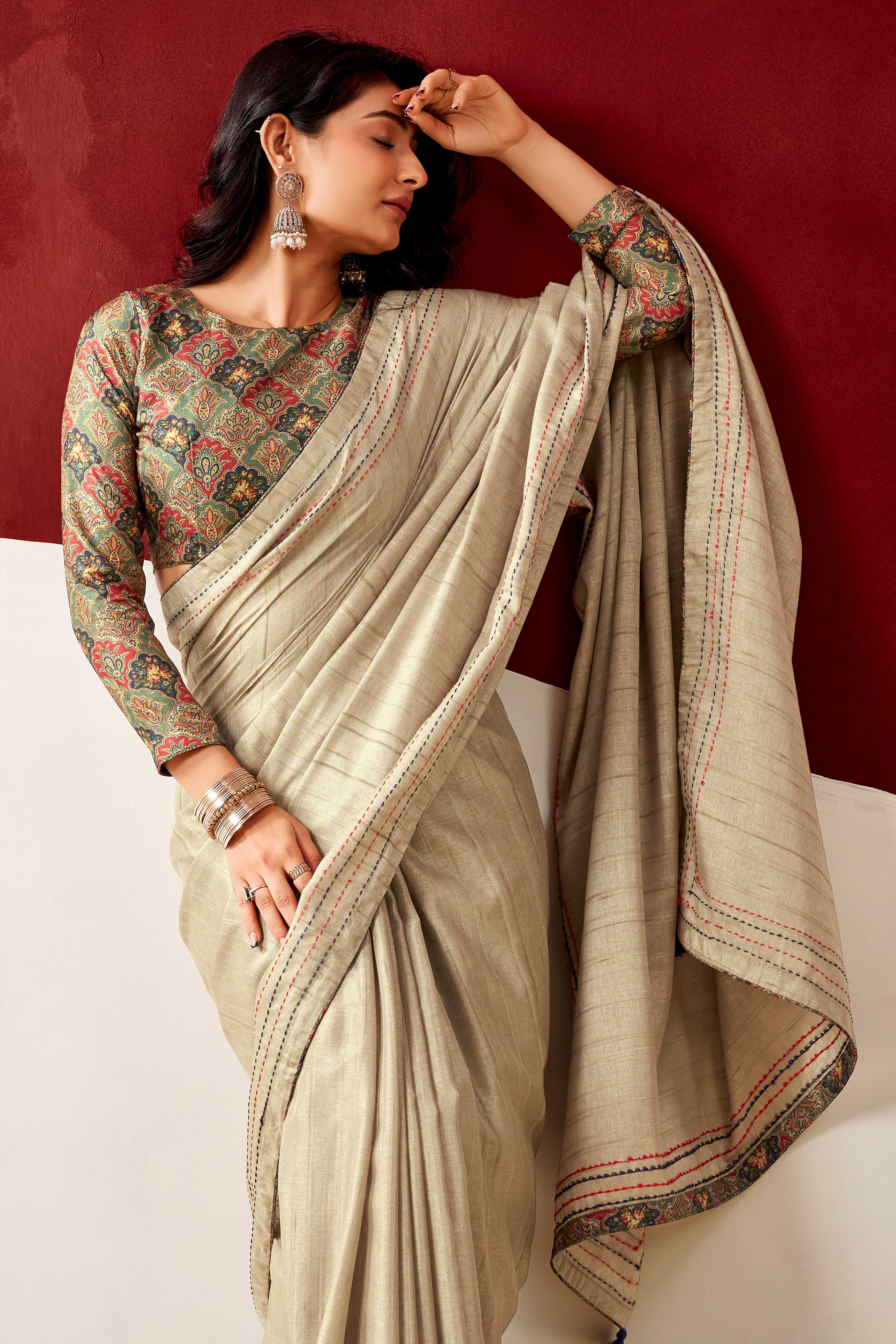 Graceful Cream Handloom Cotton Blend Saree Featuring Striped Lining Embroidery & Tassel Pallu