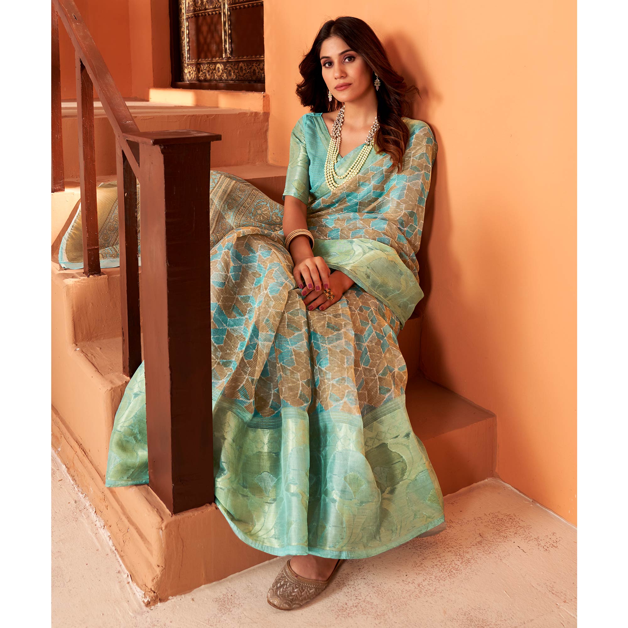 Sea Green Printed Organza Saree With Woven Border