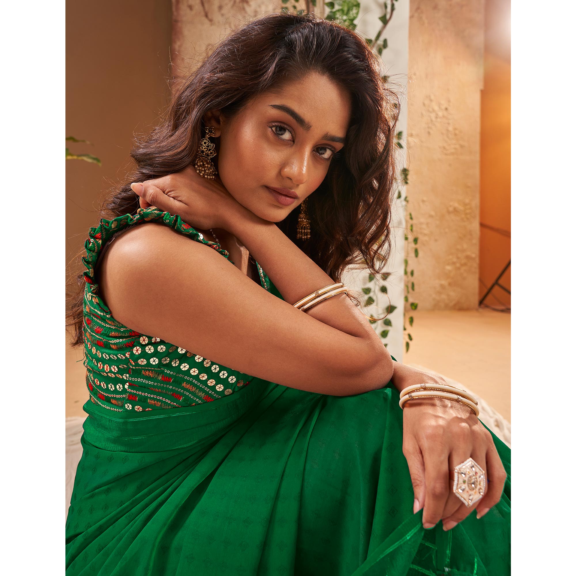 Green Woven Georgette Saree With Tassels