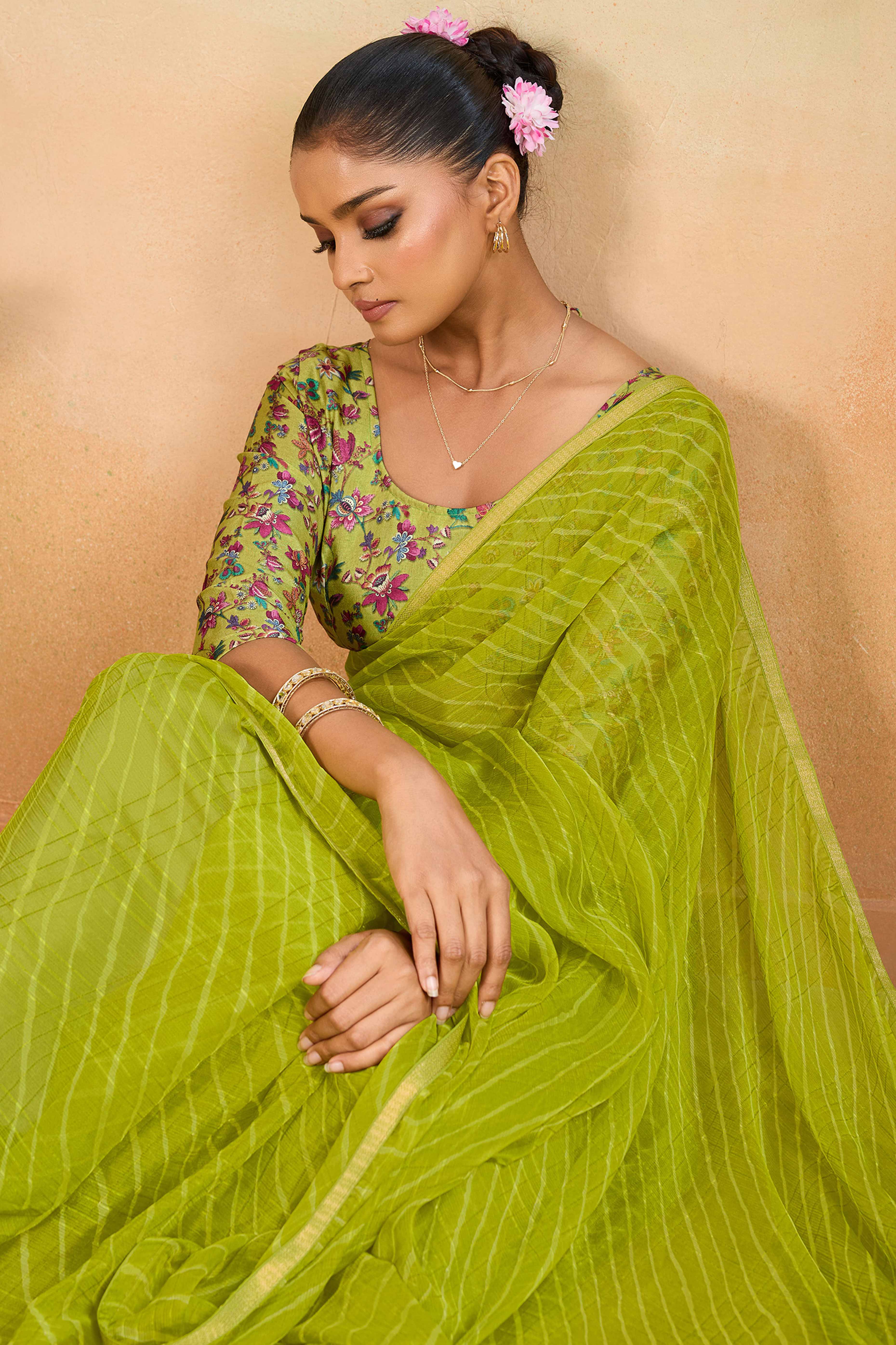 Green Leheriya Chiffon Saree Accented With Elegant Zari Lace Border Work