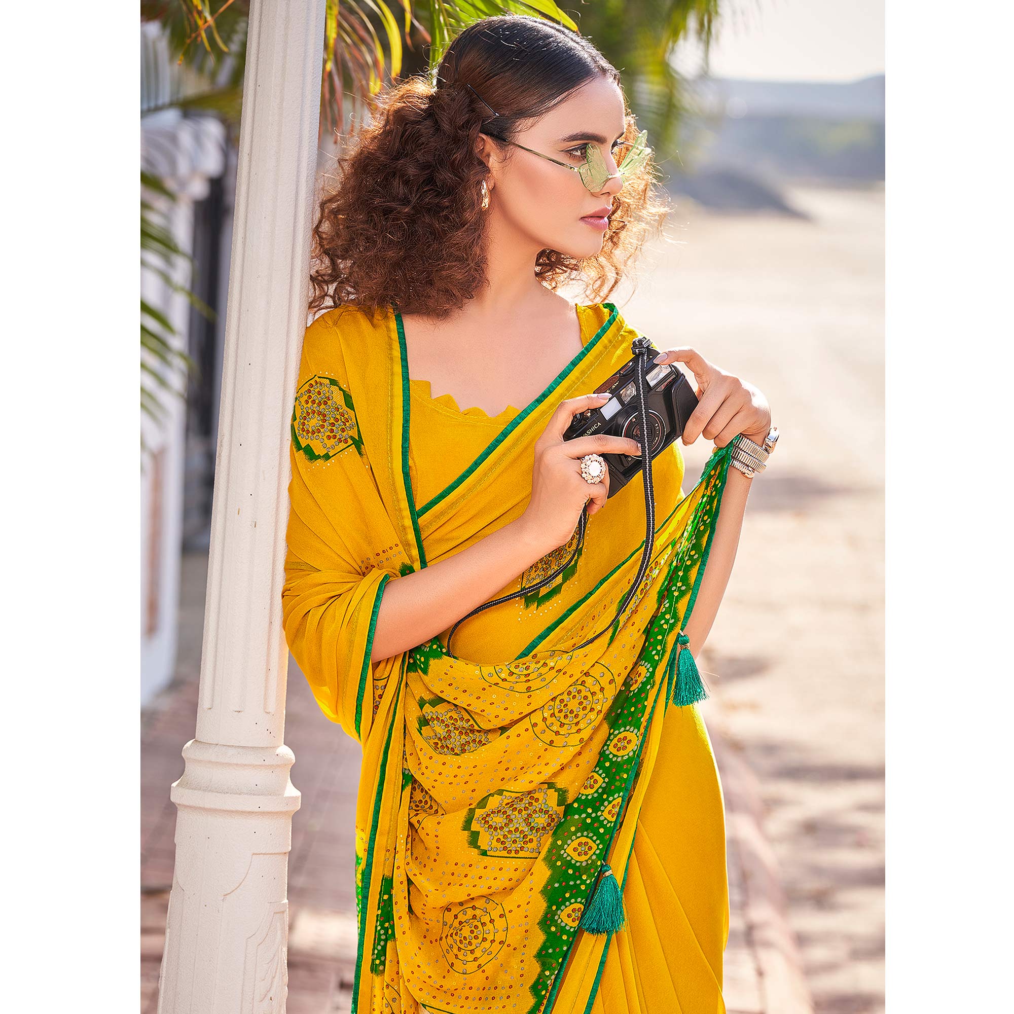 Mustard Foil Printed Georgette Saree With Tassels