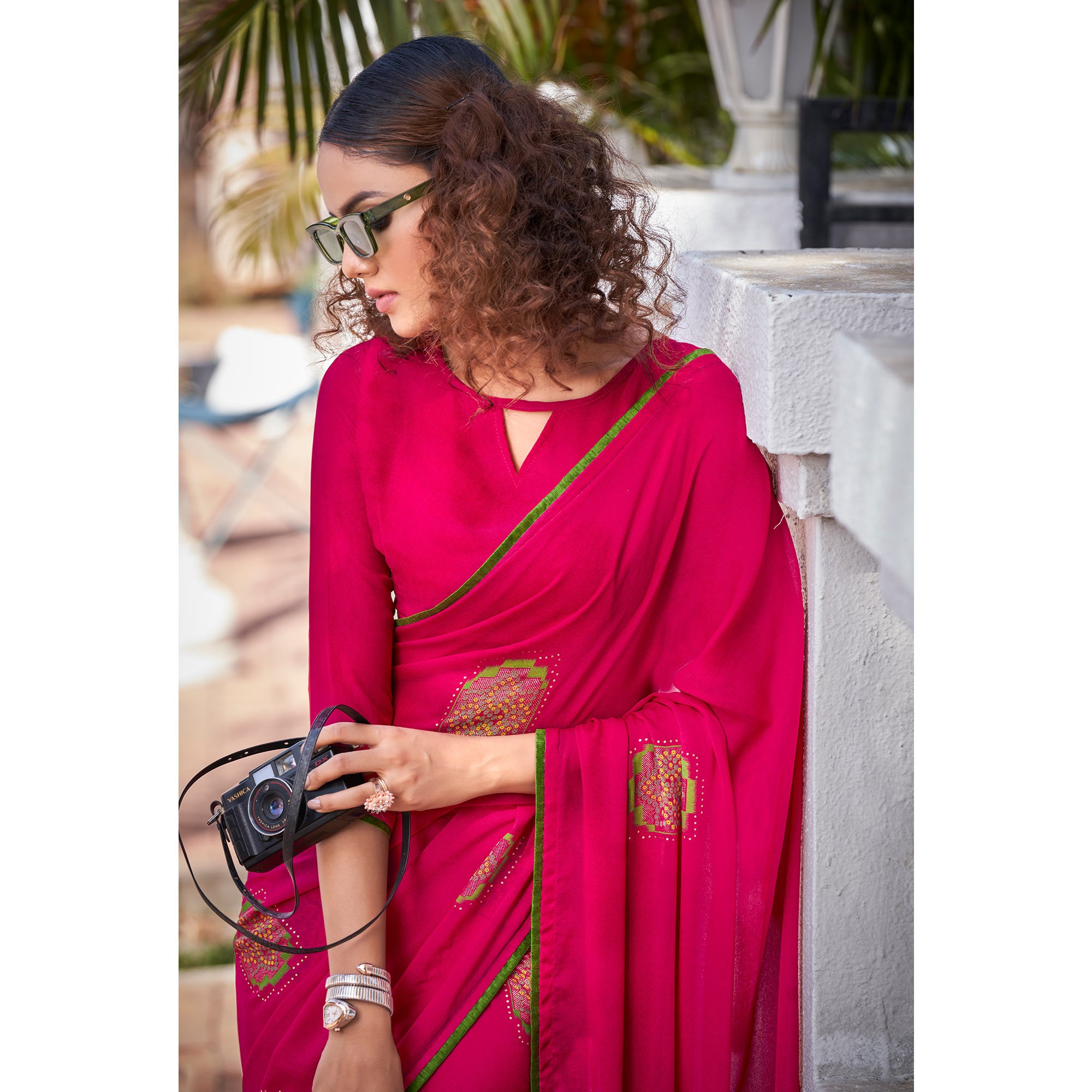 Pink Foil Printed Georgette Saree With Tassels