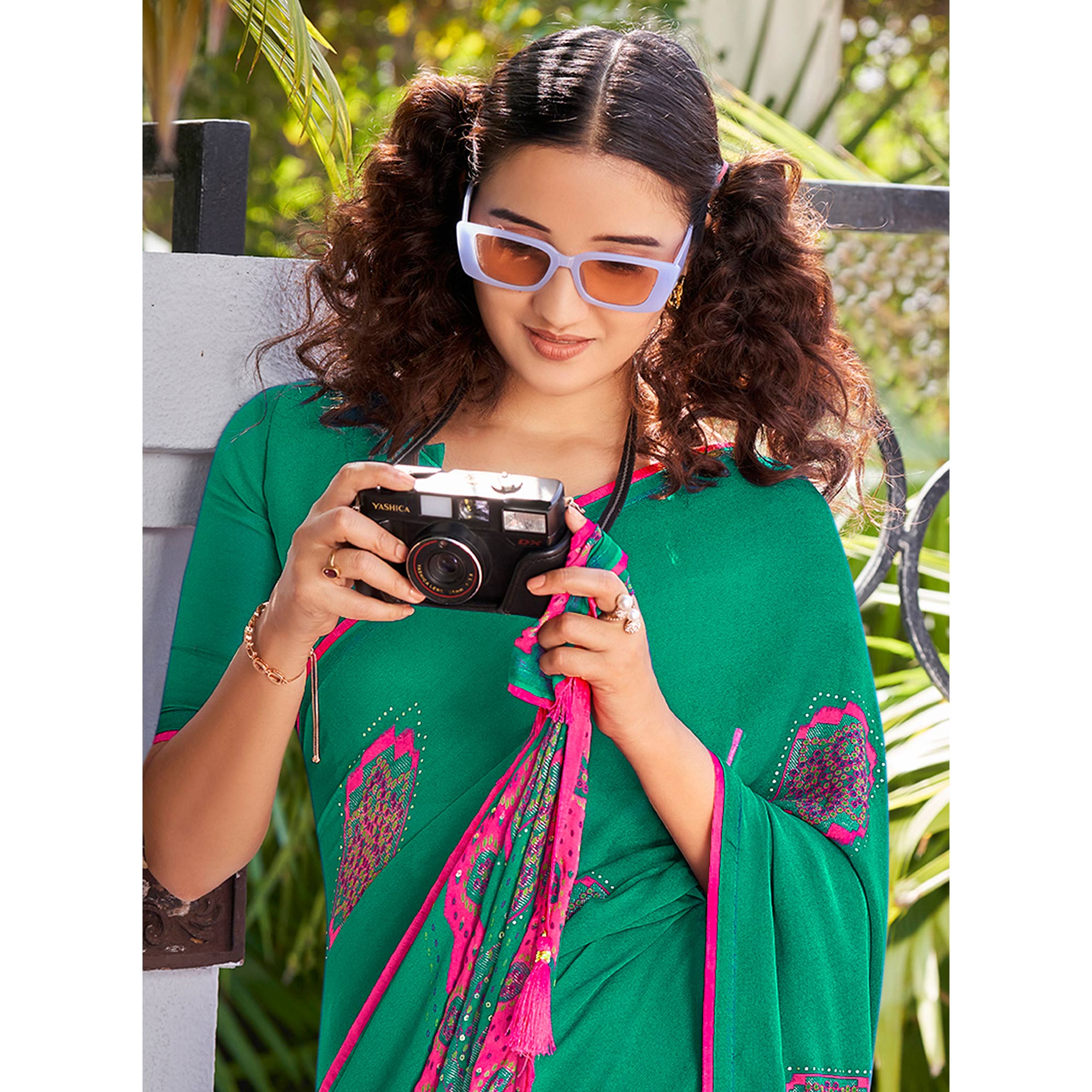 Rama Green Foil Printed Georgette Saree With Tassels