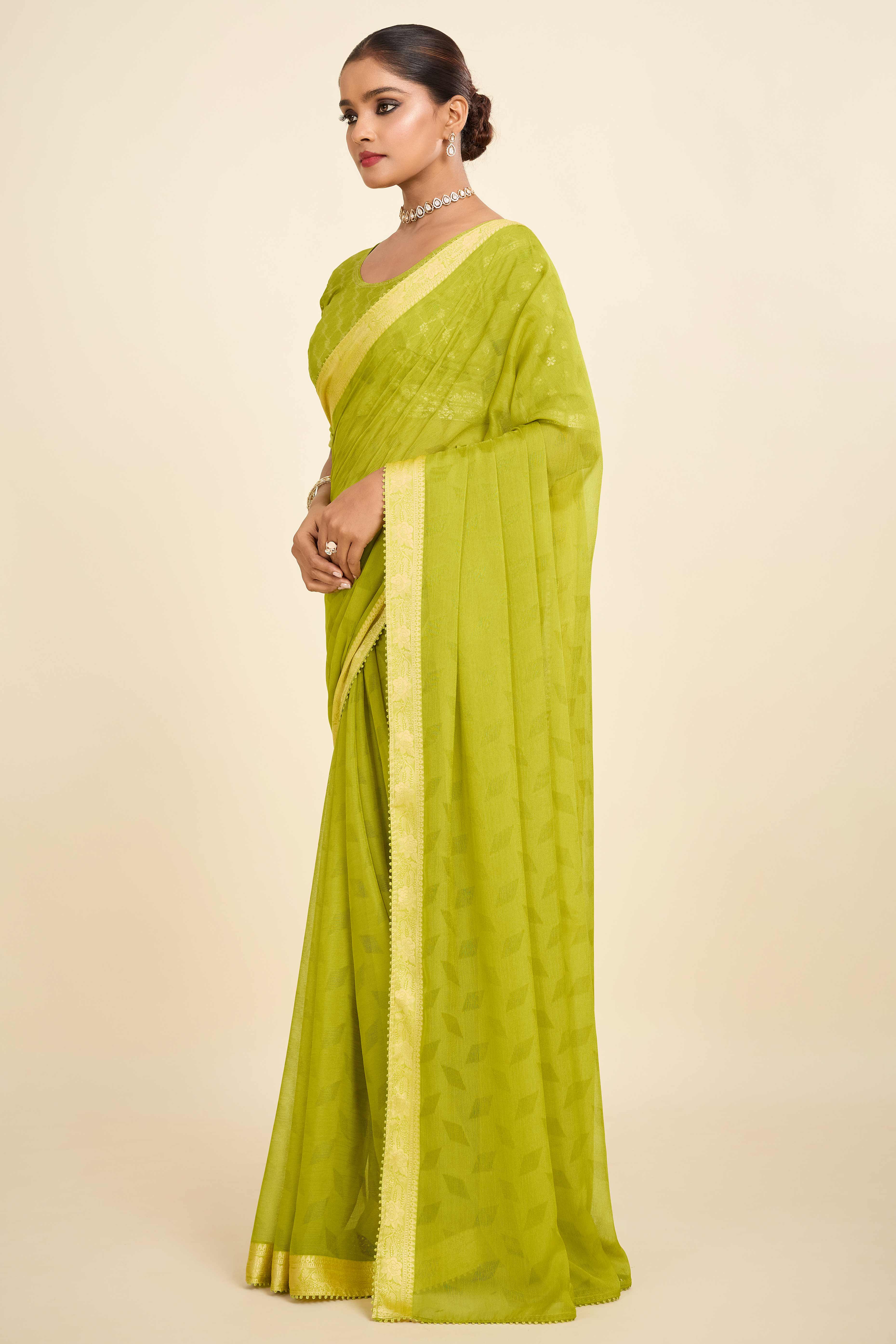 Parrot Green Printed Chiffon Saree with Intricate Woven Edging