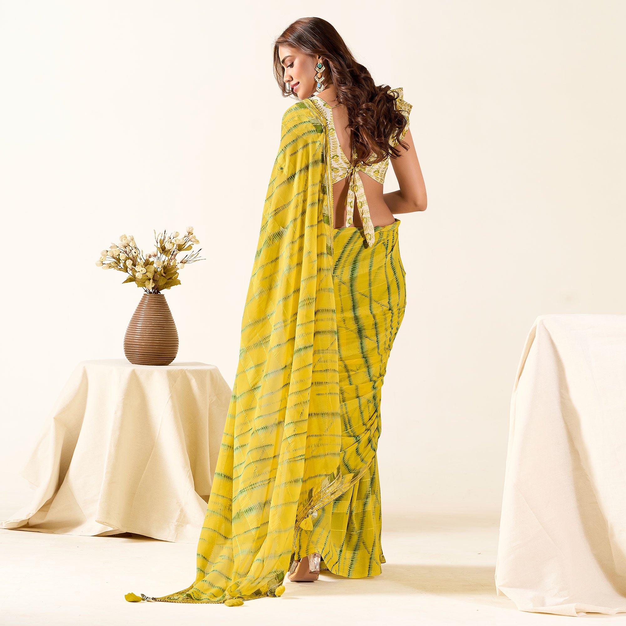 Yellow Printed With Woven Georgette Saree With Tassels