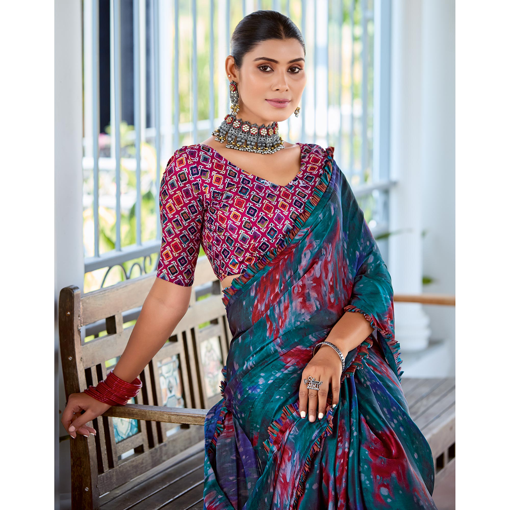 Teal Printed Satin Saree With Frill Border