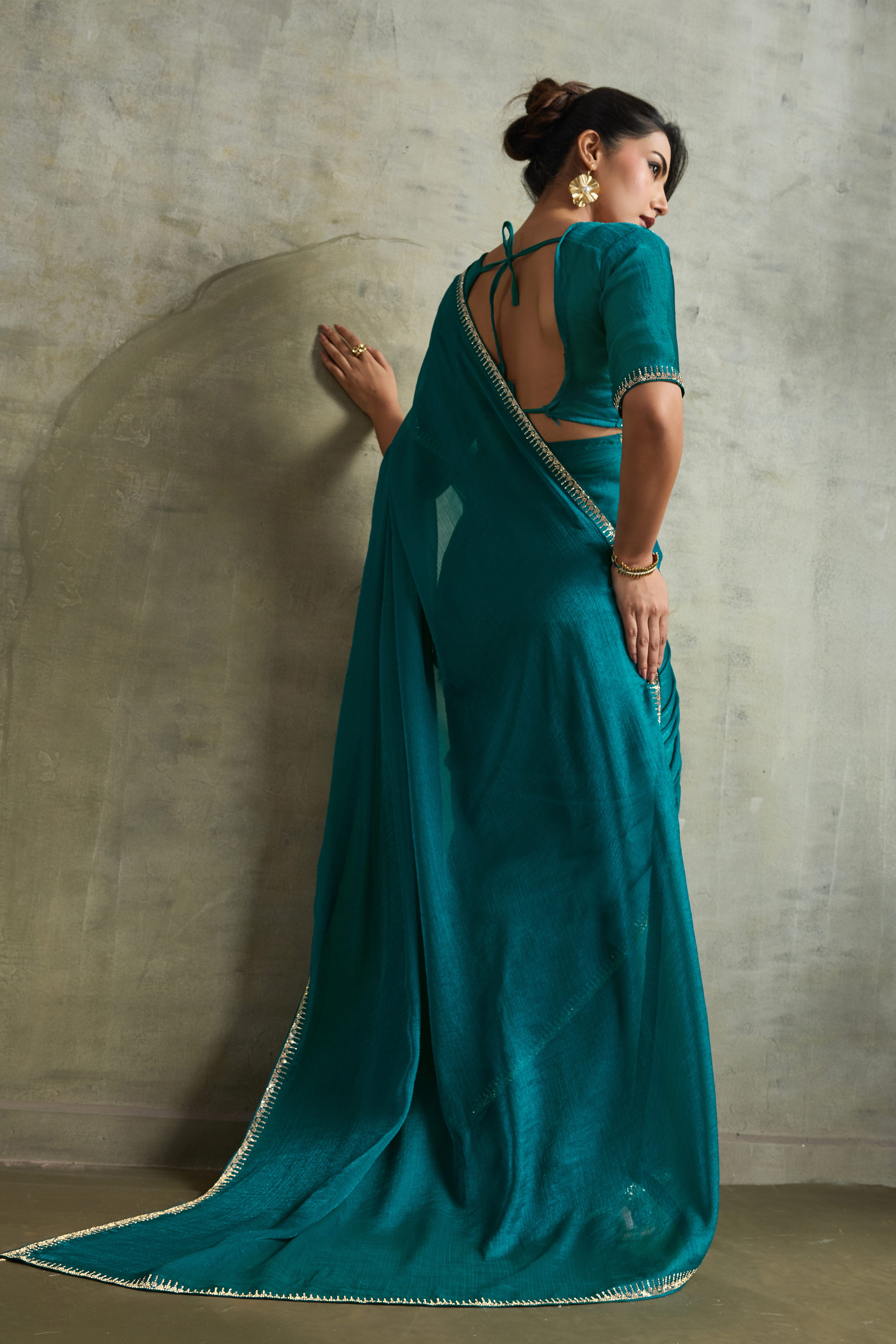 Teal Solid Chiffon Saree With Sparkling Zarkan Border & Latkan Pallu