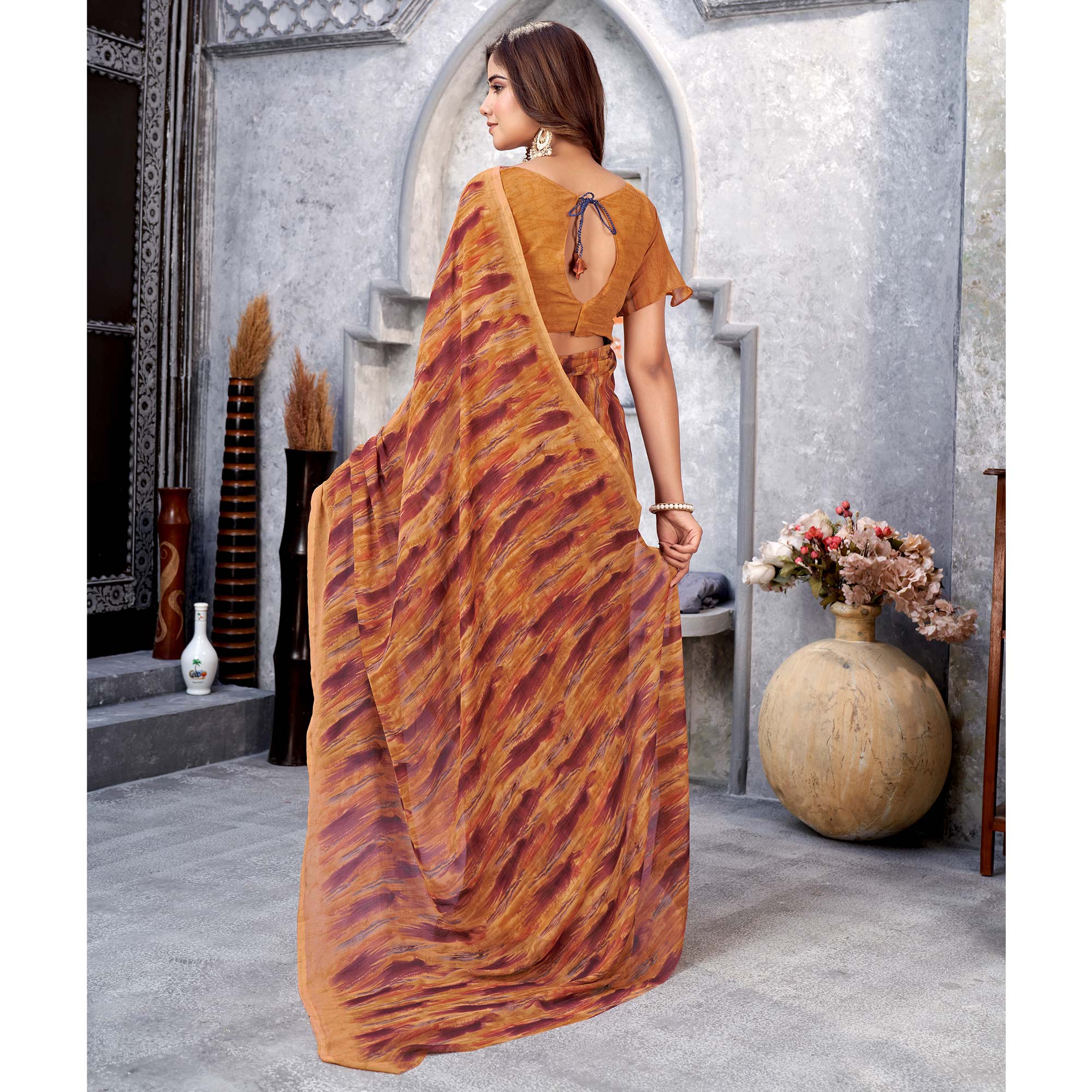 Rust Printed Georgette Saree
