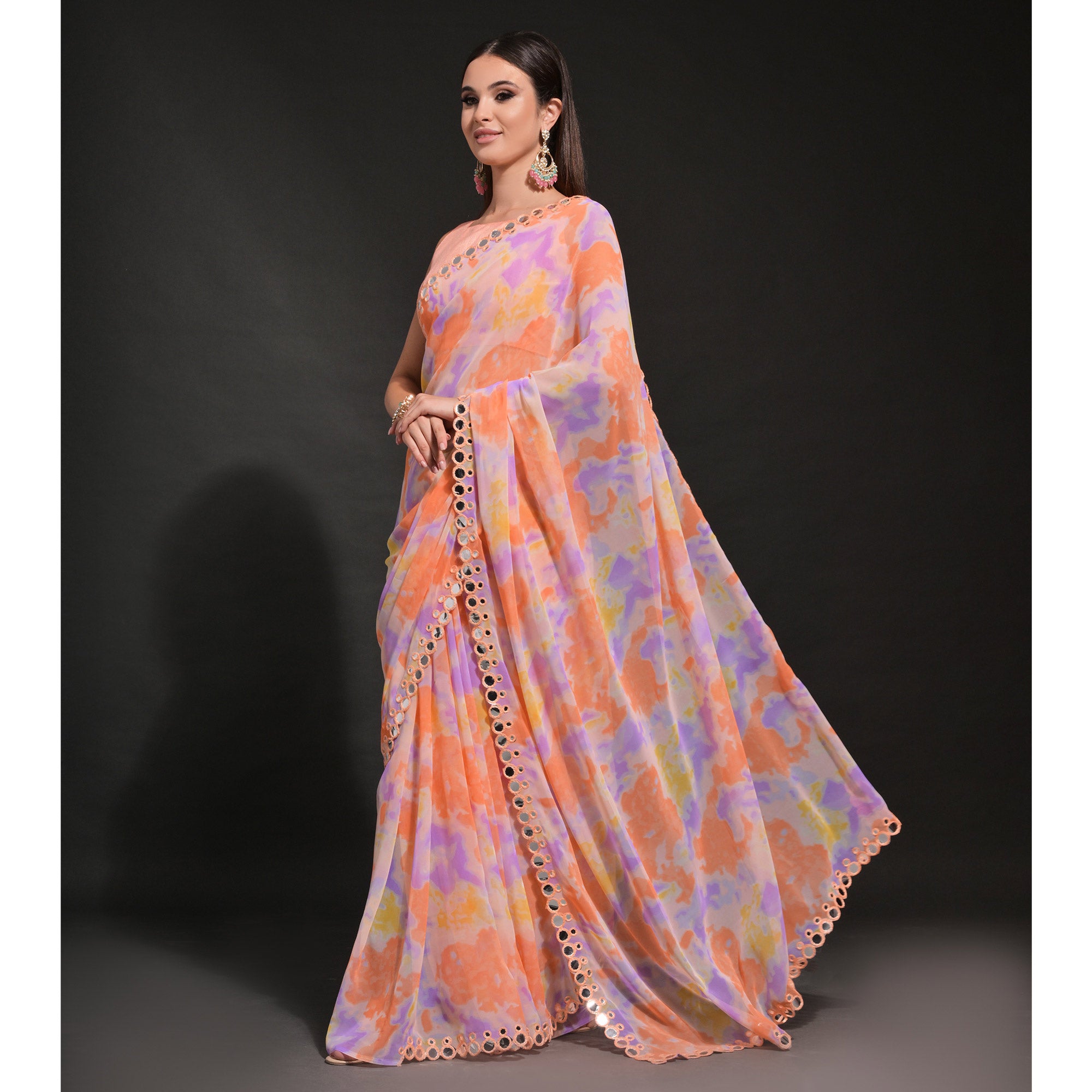 Peach Printed Georgette Saree With Embroidered Lace
