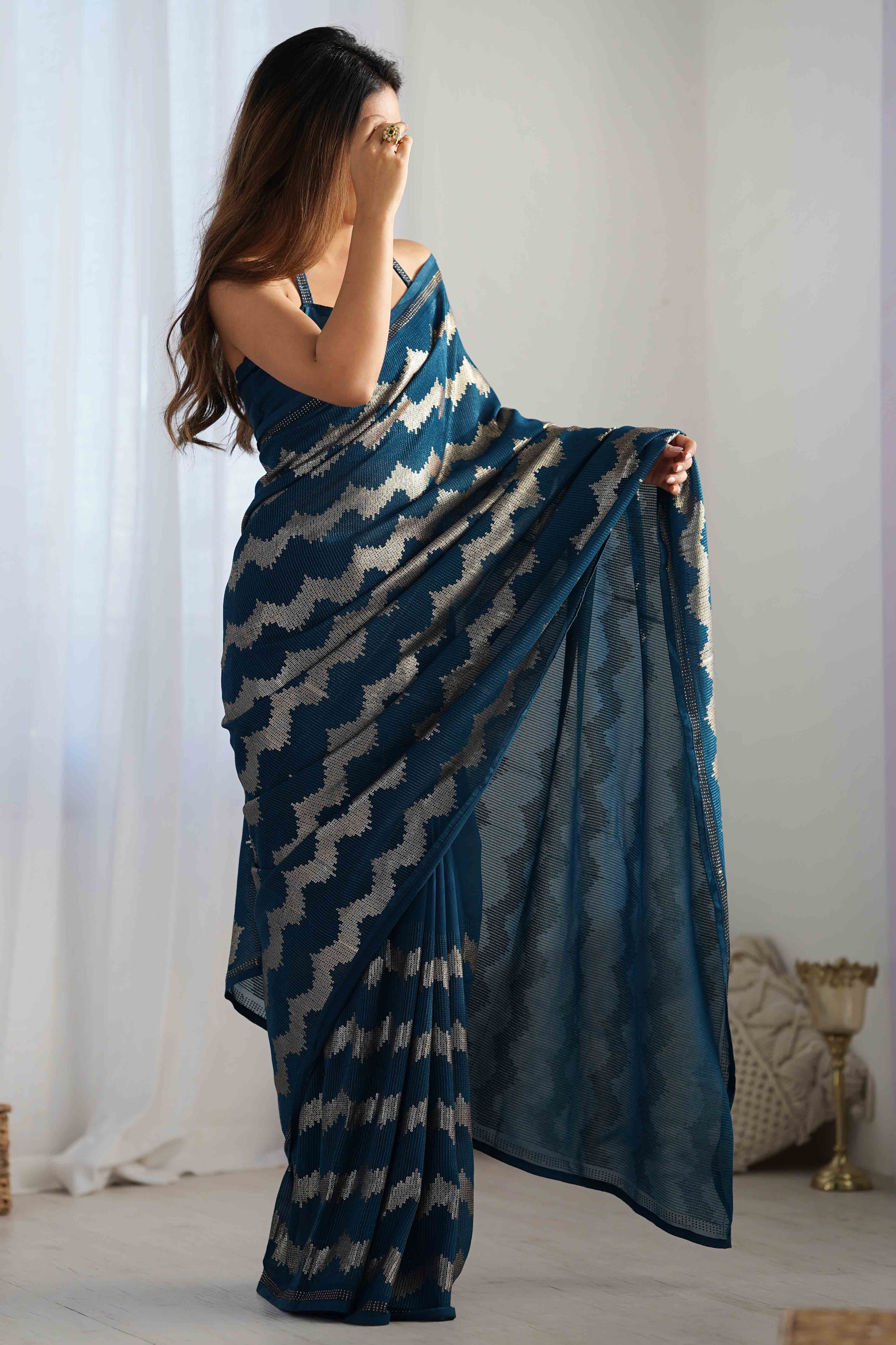 Teal Sequins Embroidered Georgette Saree