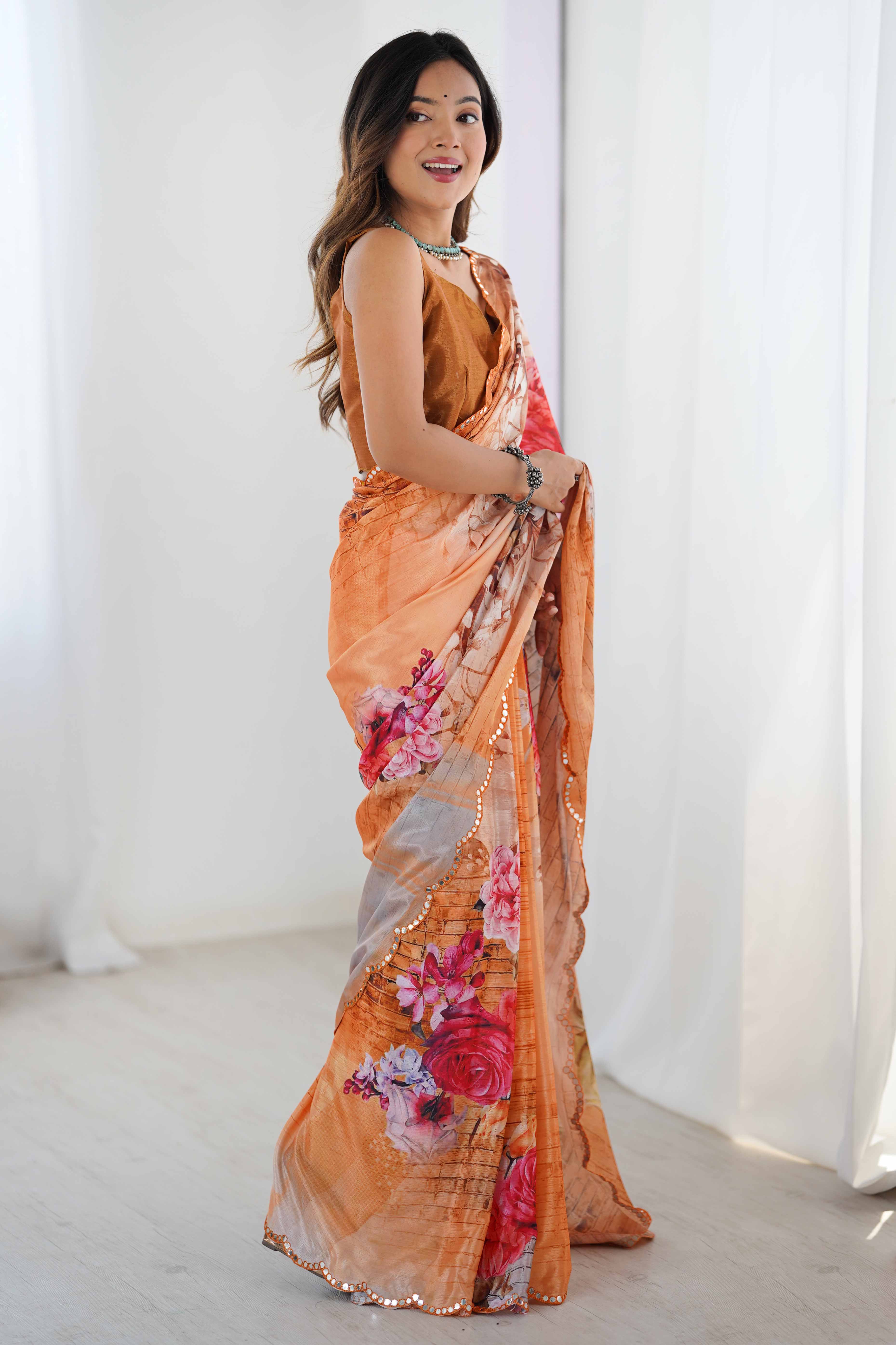 Orange Chinon Saree with Glimmering Mirror Work and Floral Prints