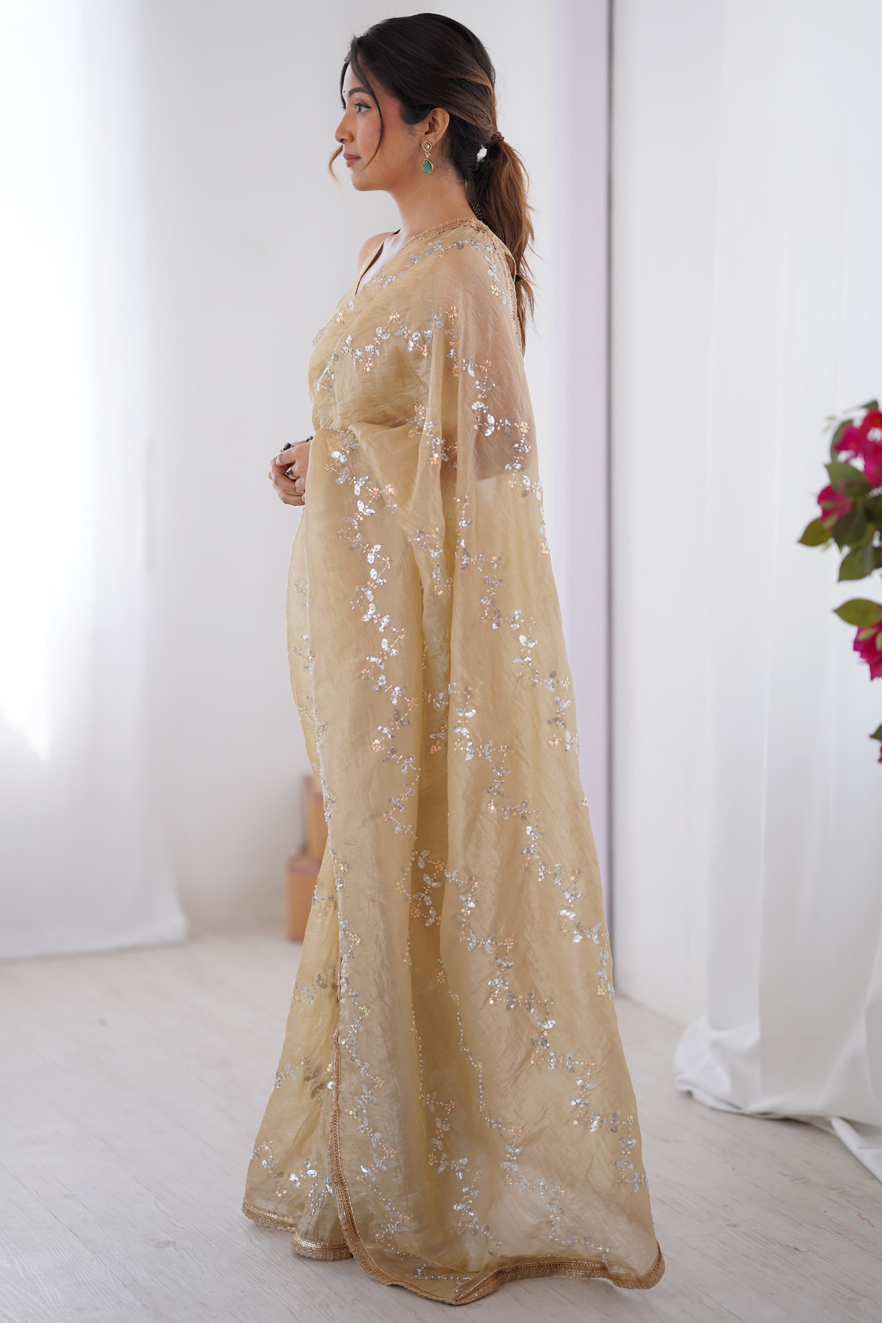 Dazzling Beige Organza Saree Accented with Sequin, Bead & Stone Work and Delicate Lace Detailing