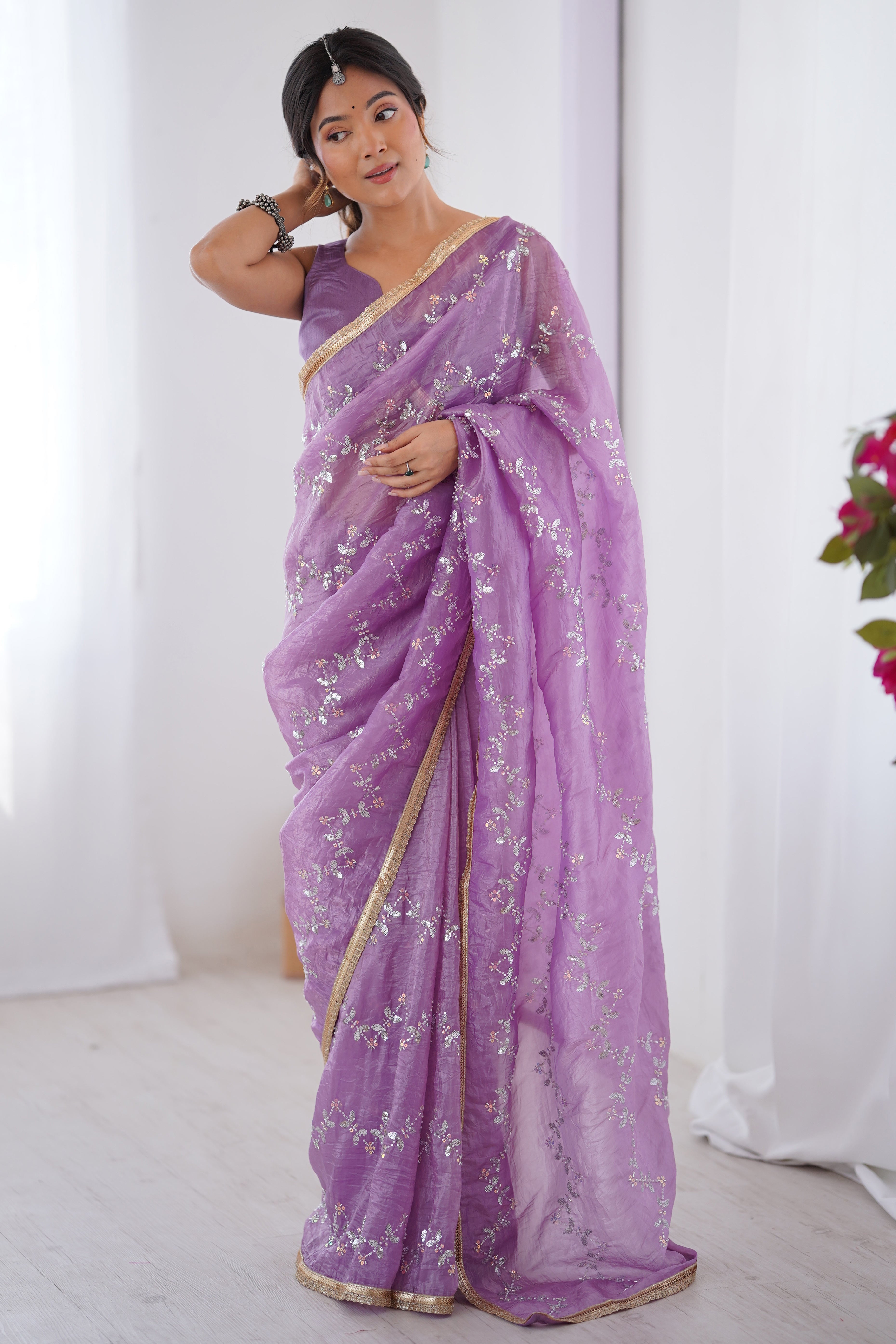 Dazzling Lavender Organza Saree Accented with Sequin, Bead & Stone Work and Delicate Lace Detailing