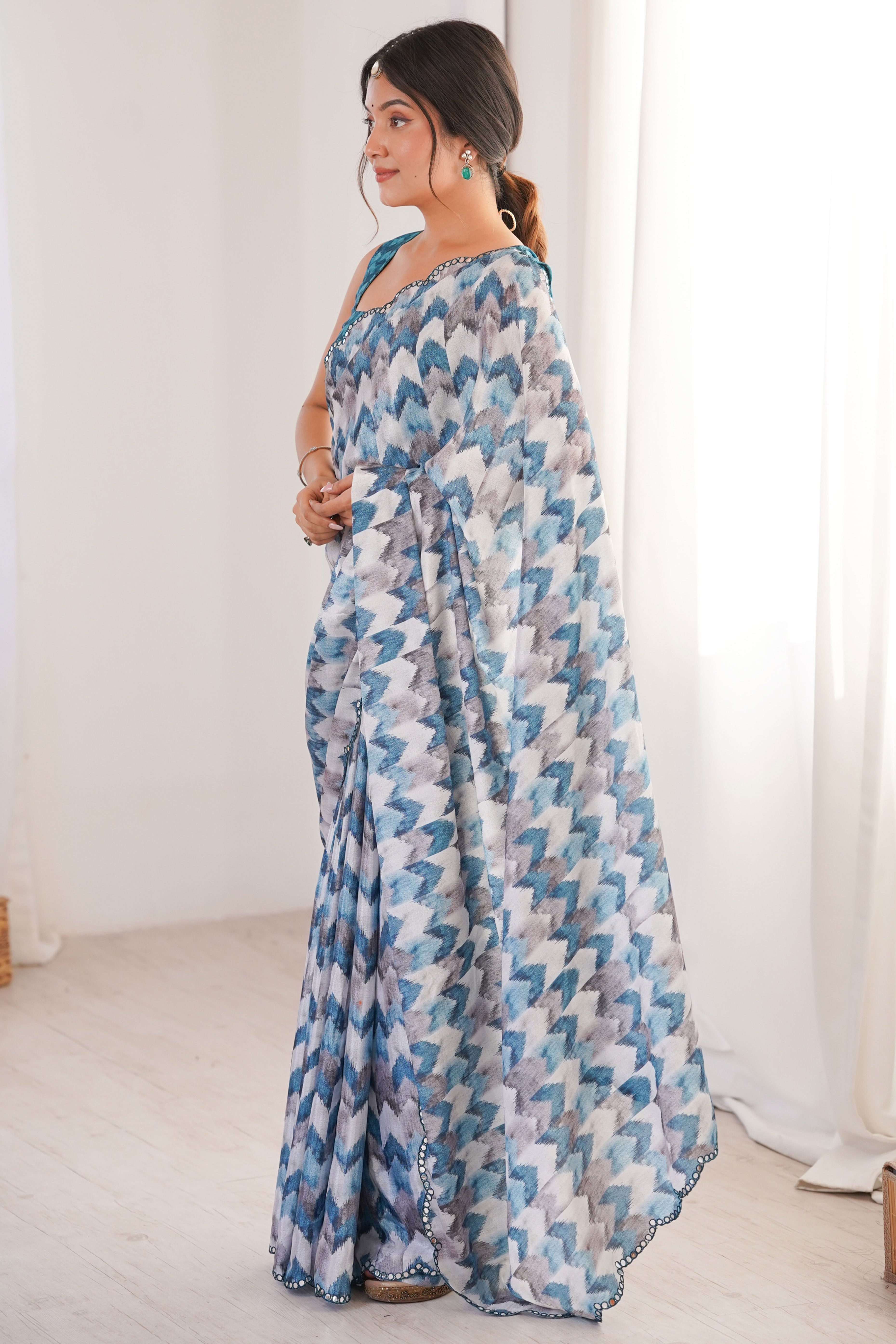 Elegant White Floral Digital Printed Chinon Saree Accented With Intricate Embroidered Border