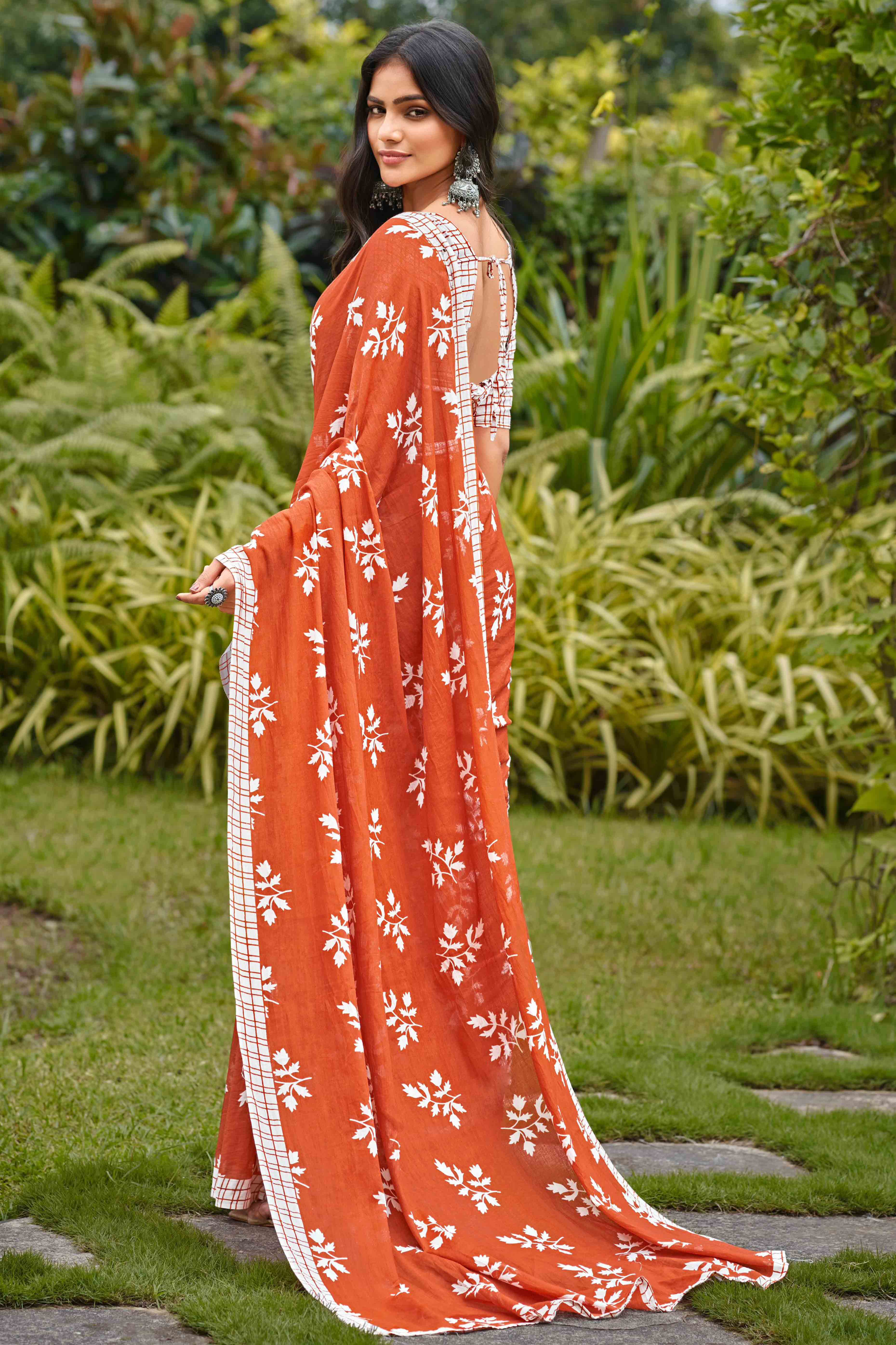 Rust Orange Pure Cotton Saree with Delicate Floral Patterns