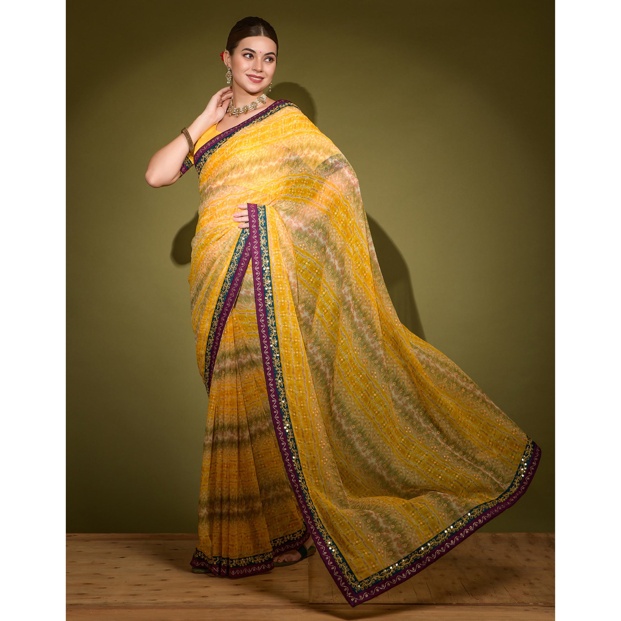 Yellow Leheriya Printed Georgette Saree With Embroidered Border
