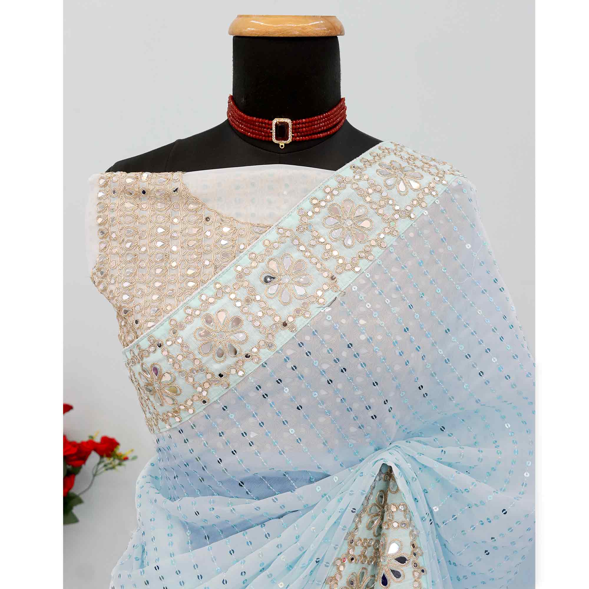 Sky Blue Faux Georgette Saree Adorned with Sequins Work and Elegant Embellishments