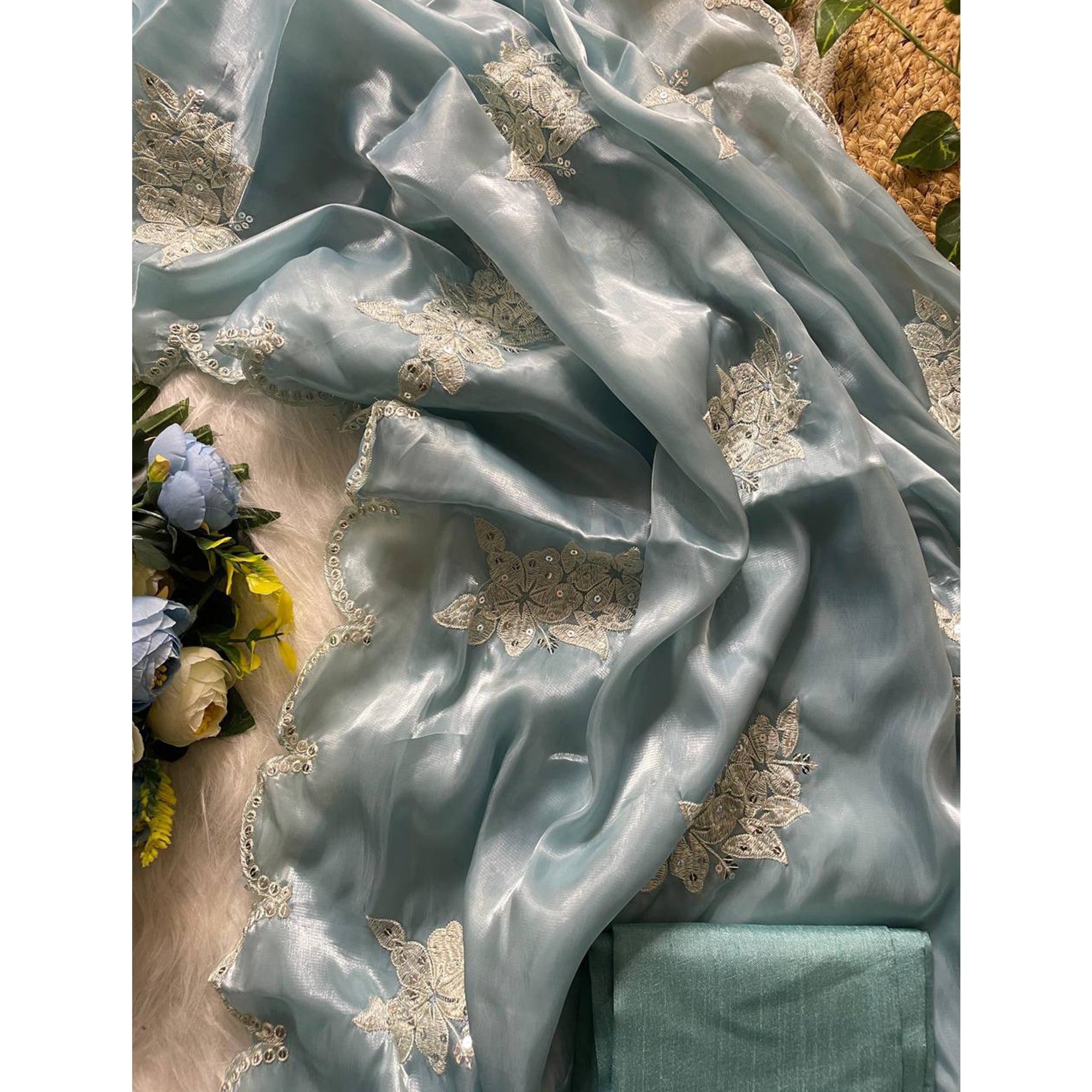 Captivating Sky Blue Floral Thread Embroidered Jimmy Choo Satin Saree With Gleaming Sequins Work