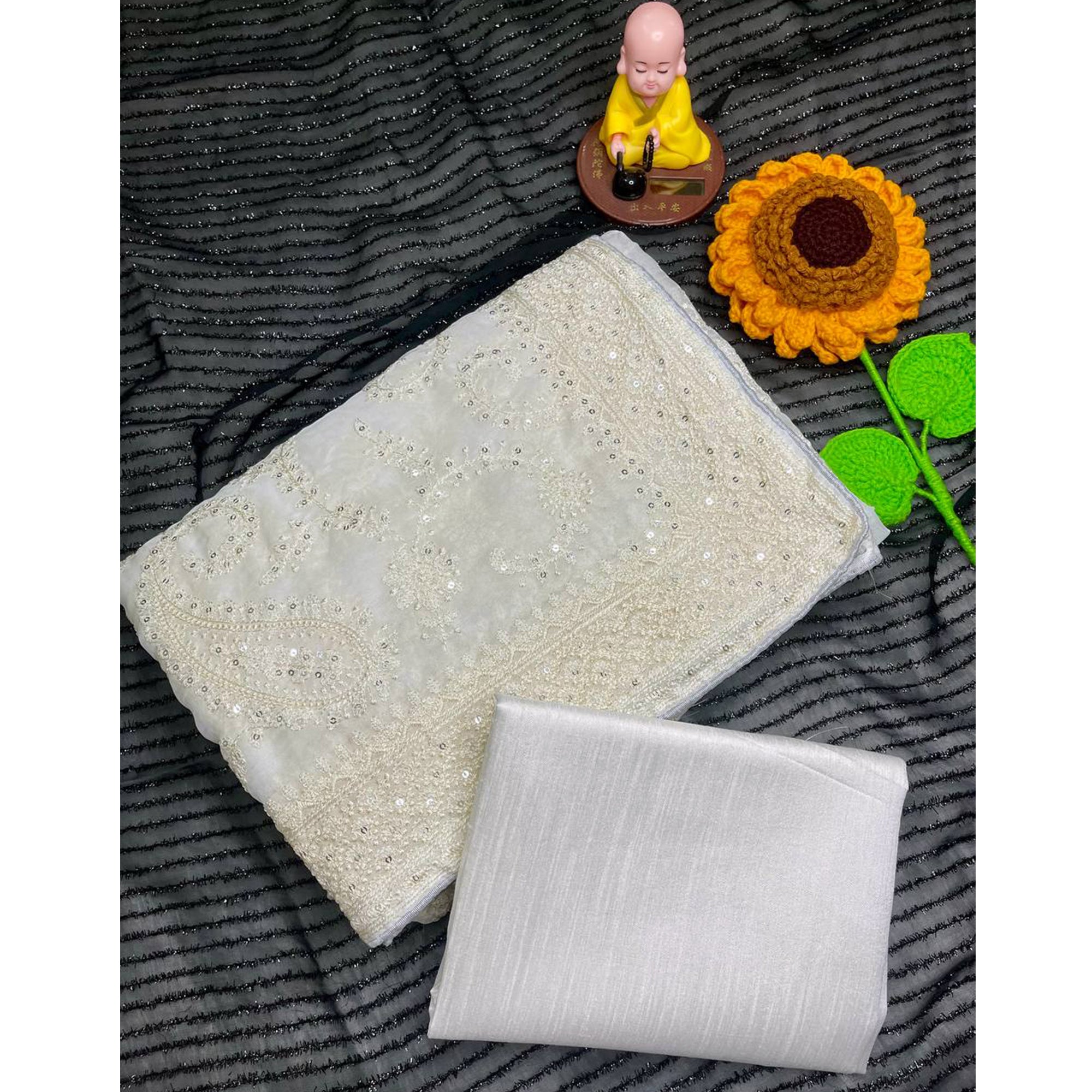 Lustrous White Organza Silk Saree Beautified With Paisley Embroidery & Glittering Sequins Work