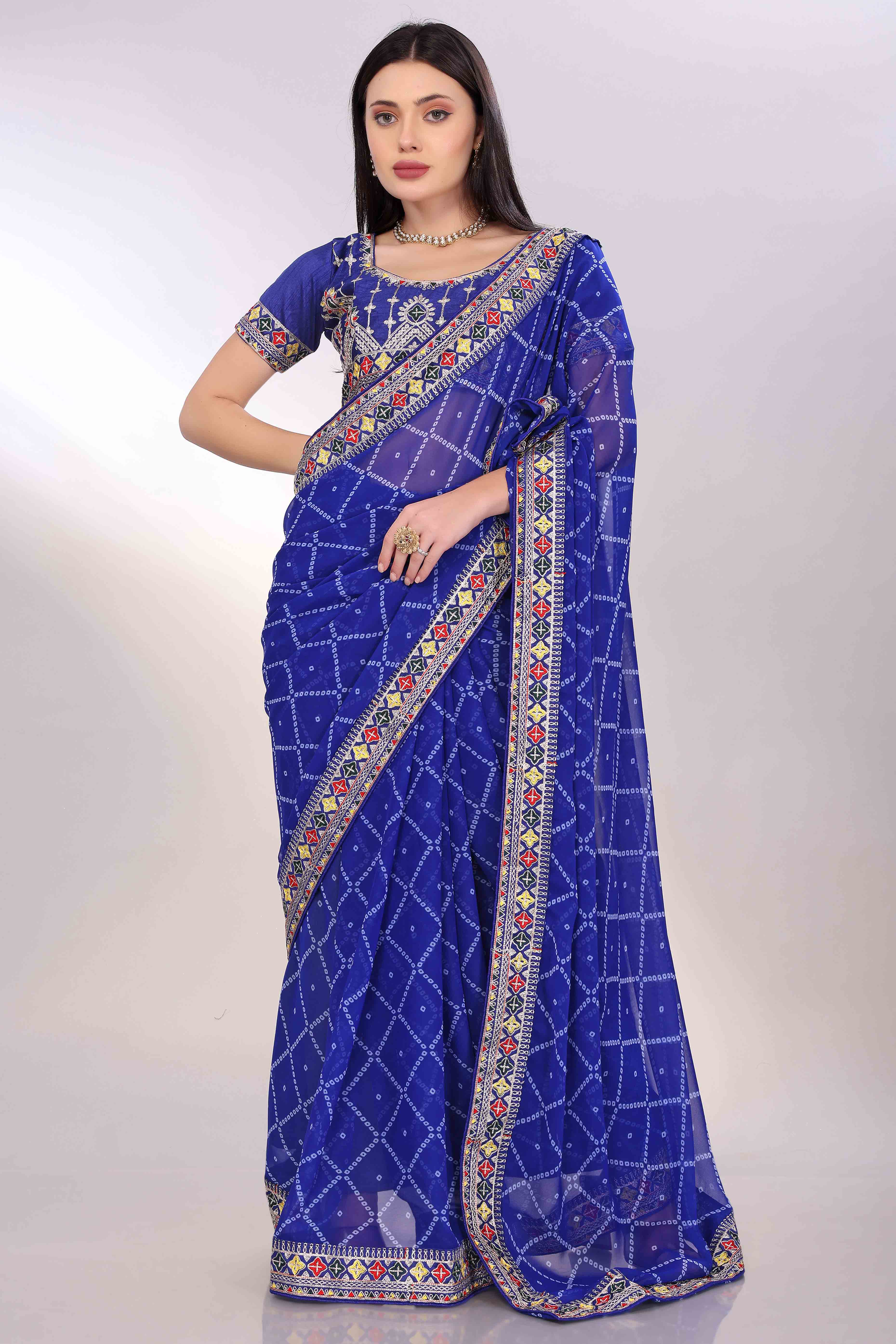 Blue Bandhani Printed Georgette Saree Framed With Elegant Embroidered Border