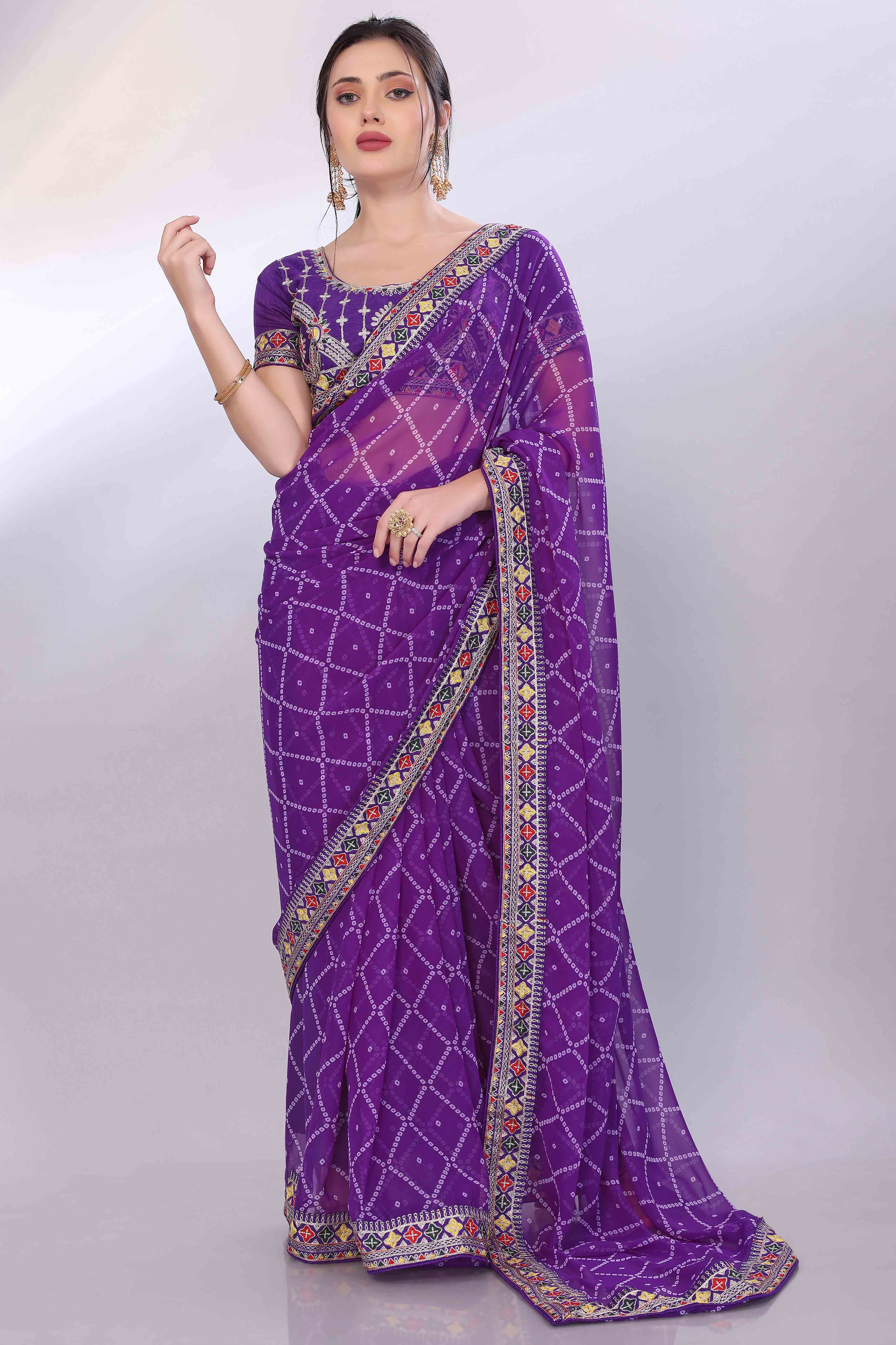 Purple Bandhani Printed Georgette Saree Framed With Elegant Embroidered Border