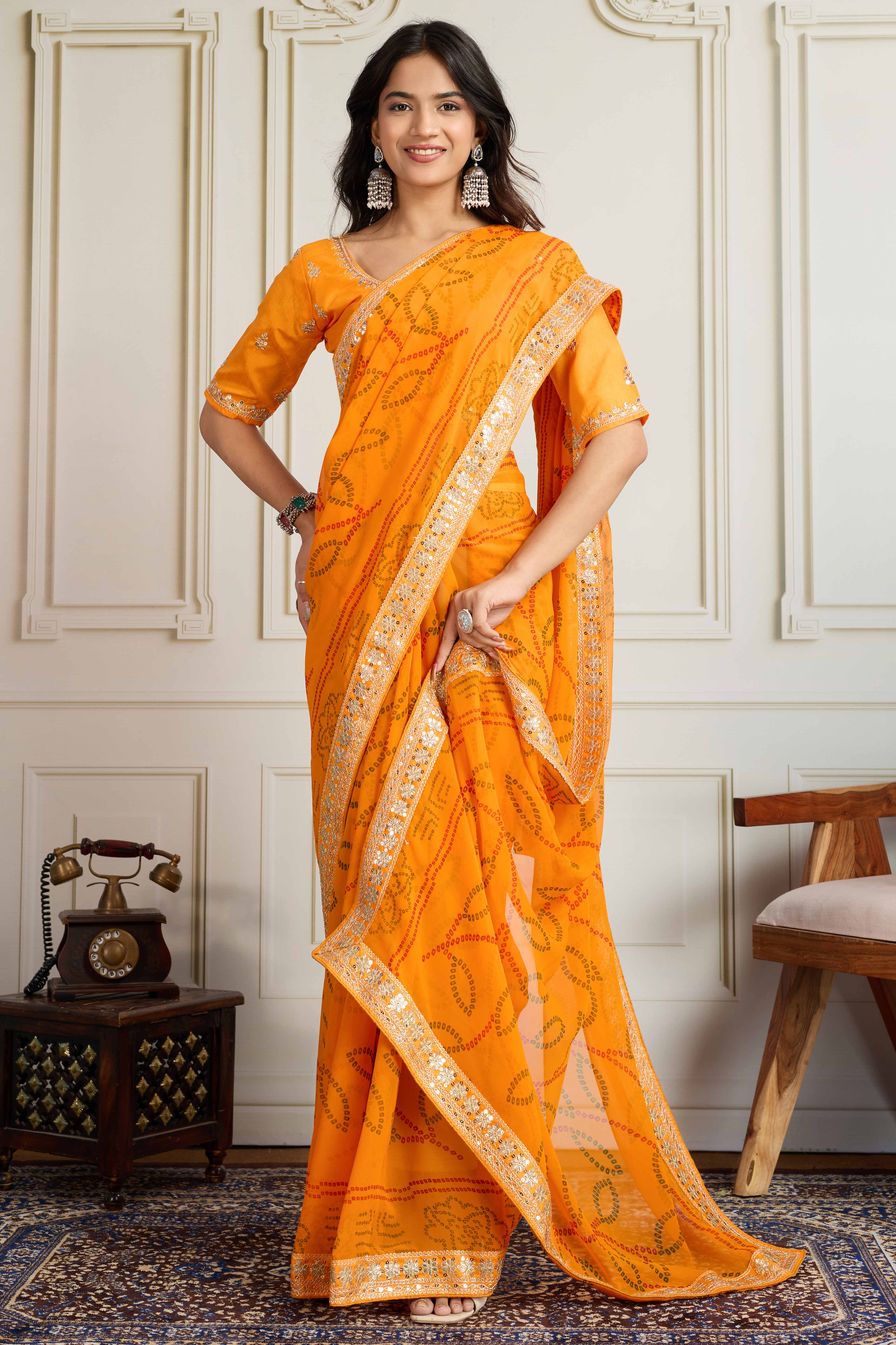 Mustard Bandhani Digital Printed Georgette Saree Enhanced With Cording Embroidered Border